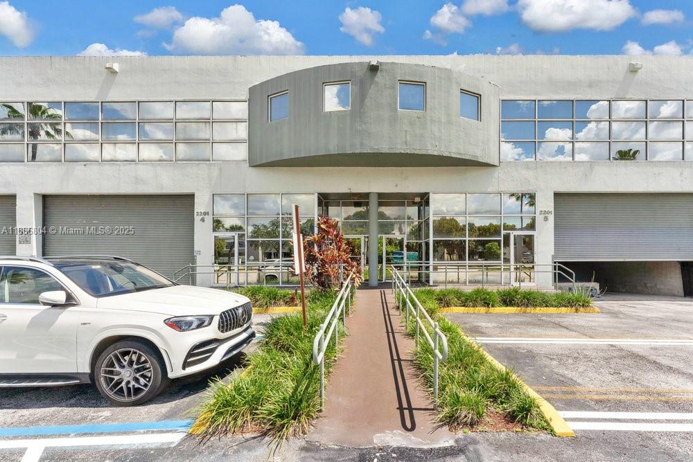 Two story office and warehouse space in Doral, features a reception area and a large office on the ground floor, with an additional secondary space that can be used as an office or break room. There are 2 bathrooms on the ground floor as well. The second floor has a spacious executive office, a conference room, 4 private workstations, 2 enclosed offices, shared work area, bathroom, and kitchen. The A/C warehouse space is approximately 62 Ft by 42 Ft with a 19 by 45 Ft. loading dock and is completely open, allowing for flexible layout options. The property also comes with assigned parking spaces.