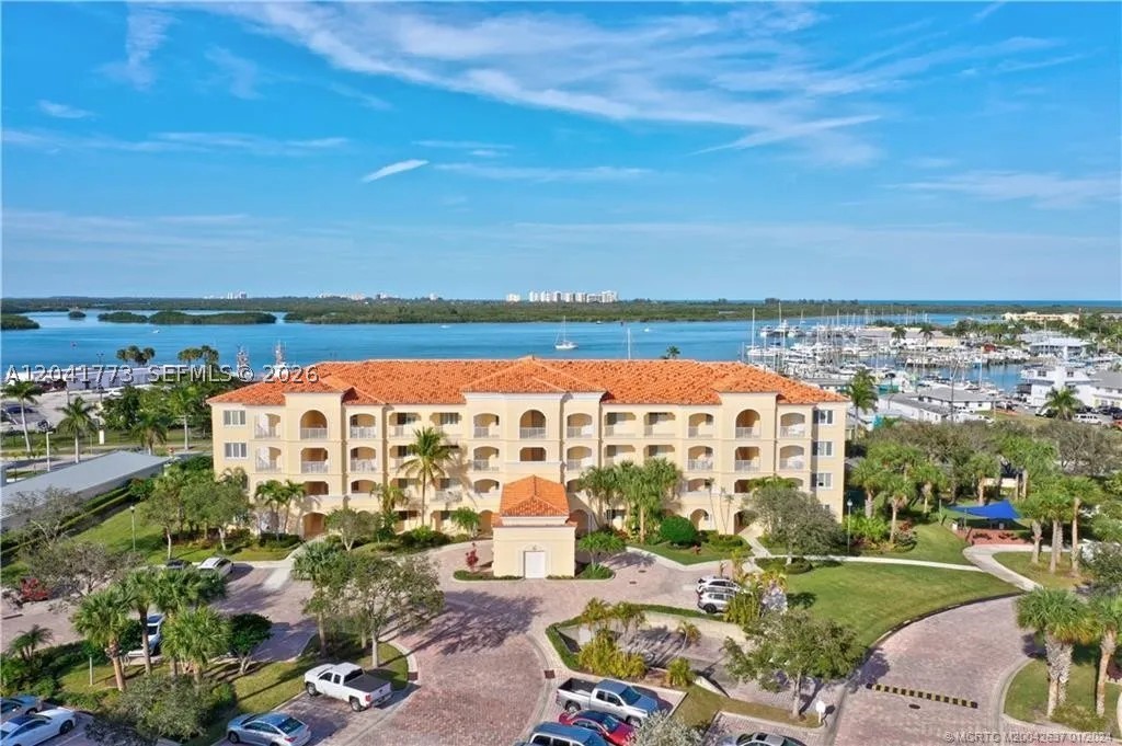 Welcome to Harbour Isle on beautiful Hutchinson Island! This spacious first-floor condominium offers nearly 2,000 square feet of comfortable living with 2 bedrooms, 2 bathrooms.
The desirable first-floor location provides easy access with no waiting for elevators and makes everyday living a breeze. The thoughtfully designed split-bedroom floor plan features a generous primary suite with walk-in closets, an oversized living and dining area, an eat-in kitchen, and a bright Florida room perfect for relaxing or entertaining.

Enjoy the exceptional Harbour Isle lifestyle with resort-style amenities, including a clubhouse, heated pool and spa, fitness center, tennis and pickleball courts, bocce, walking paths, and a vibrant social calendar. Ideally located just minutes from the beach, Fort Pierce Inlet, waterfront dining, marinas, shopping, and historic downtown Fort Pierce.

The unit may be purchased with its current furnishings. This exceptional property is also available for lease, providing flexible ownership or rental options to fit your lifestyle. Investors will appreciate that the unit can be rented immediately, making it an excellent income-producing opportunity.

Whether you're looking for a full-time residence, seasonal retreat, investment opportunity, or a luxury island rental, this spacious Harbour Isle condo offers the perfect blend of comfort, convenience & coastal living.