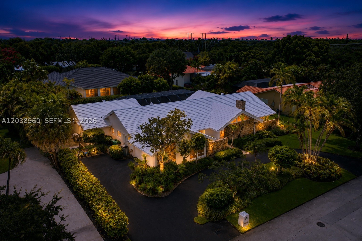 With over $200,000 invested in renovations, welcome to this exceptional custom-built residence in the exclusive Thousand Pines community, one of only 34 custom homes in this private walled enclave in the highly desirable Falls area. Situated on an elevated 16,552 SF lot in a no-flood zone, this 5-bedroom, 3.5-bath home offers a highly sought-after split-bedroom floor plan, including a private nanny/in-law suite with en-suite bath. Designed for both everyday living and entertaining, the home features soaring cedar-planked cathedral and vaulted ceilings, a gas fireplace, formal dining room, surround sound, and a spacious primary suite with dual walk-in closets and a spa-inspired bath featuring a stone soaking tub and Kohler Veil smart toilet. The oversized two-car garage features a window and sits close to an existing bathroom, offering incredible versatility to easily be converted into an additional bedroom or living space. Step outside to your private backyard retreat complete with an oversized screened pool, cabana bath, built-in outdoor grill, mature oak trees, and lush tropical landscaping creating exceptional privacy and ambiance. Additional highlights include a whole-house generator, whole-house water filtration system, gas appliances, and hurricane protection. Residents enjoy lighted tennis and pickleball courts while being just minutes from The Falls, Baptist Hospital, Lifetime Fitness, premier dining, shopping, and top-rated public and private schools.