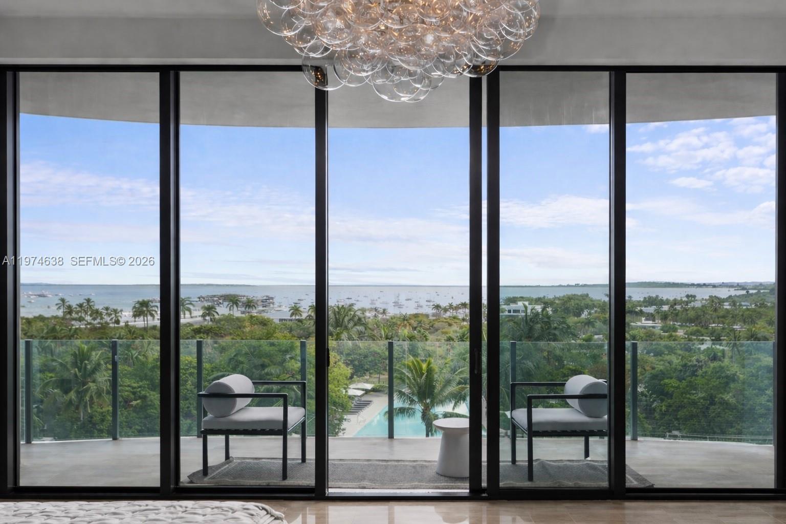 Fully remodeled 3BD/3.5BA in coveted Two Park Grove with sweeping bay views and refined designer upgrades throughout. This 3,233 SF residence features Eggersmann custom cabinetry, an ITALKRAFT kitchen and primary bath, Sub-Zero & Wolf appliances, Calacatta marble, and Dornbracht and Franz Viegener fixtures. Curated finishes include Murano and Baccarat lighting, Lindsey Adelman fixtures, silk and grasscloth wall coverings, and Italian doors by Mia Cucina. A 250-bottle Sub-Zero wine column, smart prewiring, built-in Murphy bed, and three storage units enhance both functionality and luxury. Two private balconies and two assigned parking spaces complete the residence. Residents enjoy valet, full-service spa, state-of-the-art fitness center, yoga and Pilates studios, theater, resort-style pools, and a private restaurant. An exceptional turnkey offering in the heart of Coconut Grove, just moments from waterfront parks, marinas, and the neighborhood’s premier dining and shopping.