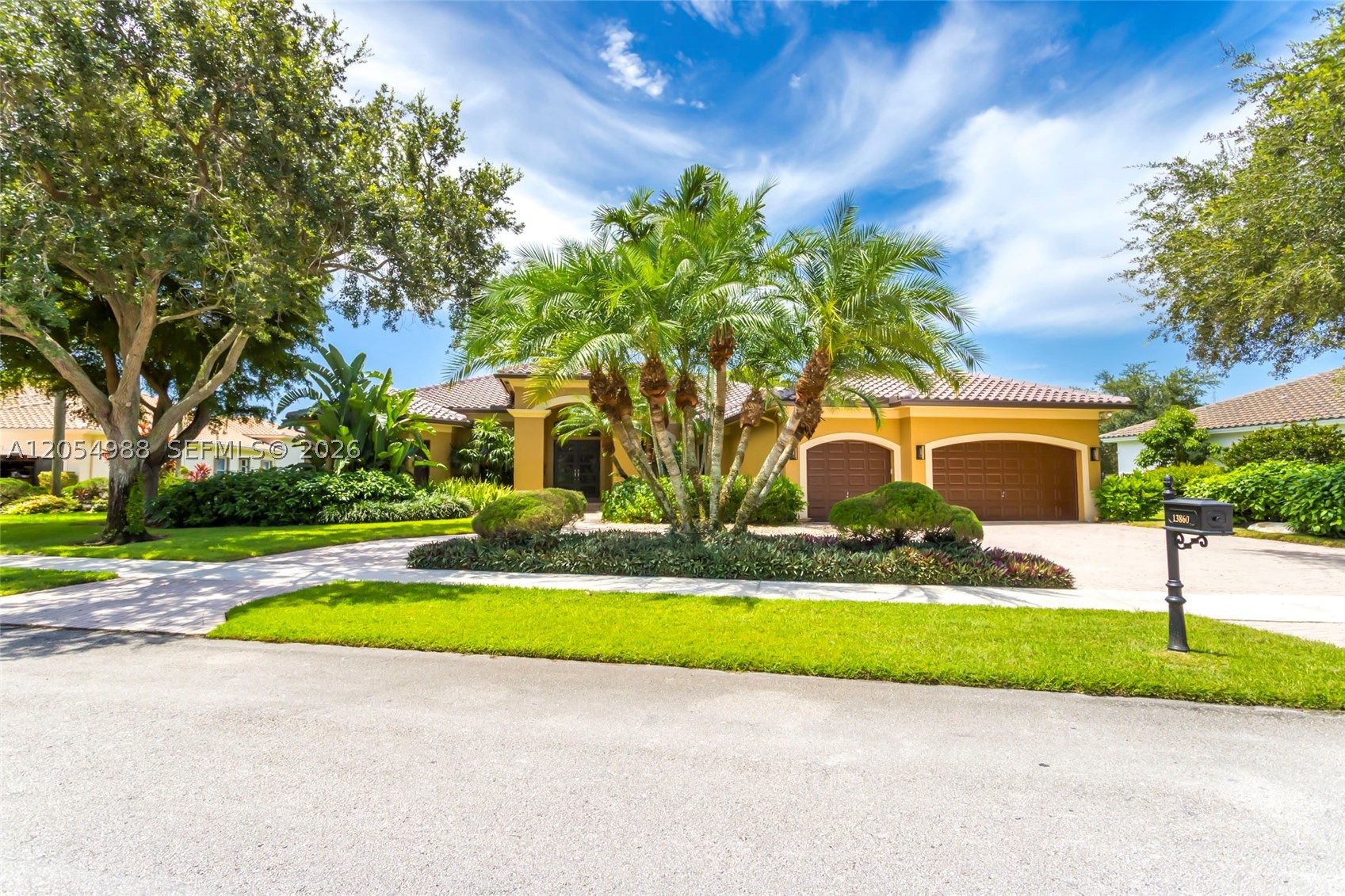 Welcome to this beautifully updated 5-bedroom, 4-bathroom waterfront pool home situated on a builder's acre in the highly desirable Imagination Farms community. Thoughtfully maintained, this exceptional residence features a new roof, impact windows and doors, newer A/C units, a newer water heater, a resurfaced pool, fresh interior paint, and new flooring throughout. As you enter, you're welcomed by spacious formal living and family rooms filled with natural light. The open kitchen is designed for both everyday living and entertaining, offering granite countertops, wood cabinetry, stainless steel appliances, and a generous pantry. The expansive primary suite serves as a private retreat with spacious walk-in closets and a luxurious en-suite bathroom featuring a soaking tub and separate shower. One of the guest bedrooms offers the convenience of its own private en-suite bathroom, while another guest bathroom features double vanities, making it ideal for family or guests. A dedicated office, which can easily serve as a fifth bedroom, is conveniently located adjacent to a cabana bath, providing flexibility for a home office or guest suite. The additional bedrooms are thoughtfully situated on the opposite side of the home for added privacy. Step outside to your private outdoor oasis featuring a fully screened, resurfaced pool complete with elegant waterfalls and therapeutic jets, all overlooking tranquil lake views. Set on a sprawling builder's acre, the expansive backyard offers endless space to relax, entertain, or create the outdoor retreat of your dreams while enjoying Florida's beautiful lifestyle.