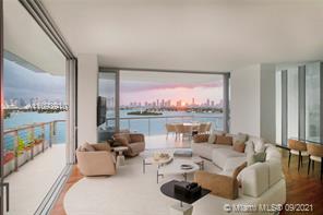 Composed of 59 individually designed waterfront residences around a glittering lagoon, Monad Terrace by Pritzker Winner, Jean Nouvel, provides brilliant light, private outdoor space, climbing gardens, unique sawtooth honeycomb facades & stunning sunset views of Biscayne Bay. Kitchens with dramatic sculptural marble island in Calacatta. Master baths with richly veined, spacious stone countertops, marquetry flooring and tiled walls. Other notable features include custom cabinetry & built-in features, designer fixtures, teak flooring throughout & private elevators. Immediate Occupancy. Photos and Renderings are from model residences.