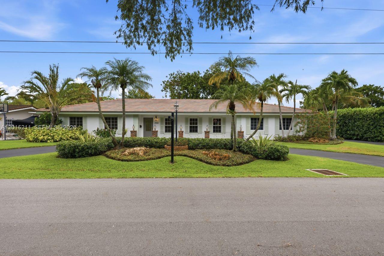 Best kept secret in Pinecrest! Luxury five bedroom home with canal access and lake adventures! This fabulous five bedroom home located in the coveted "Palmetto Island" of Pinecrest features one of the quietest locations and serene neighborhoods you will find. A rare gem of just 71 homes that offers canals with direct lake access, nature and the lush greenery Pinecrest is known for. Top of the line appliances in the Chef's kitchen with Sub Zero/Wolf appliances, heated saltwater pool, granite countertops, and butler's pantry. The enormous primary bedroom with ensuite bathroom (including a jacuzzi tub) and walk-in closets. Partial impact windows, two-car garage and serene light that graces the home from every angle.