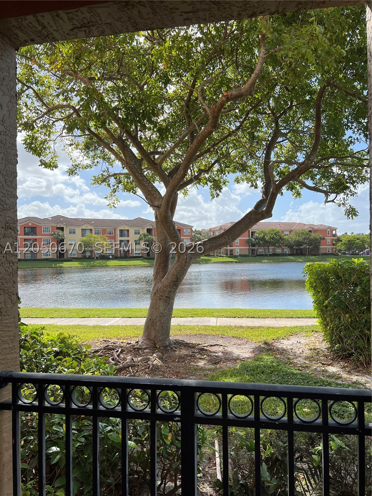 Beautiful 1 bedroom and 1 bathroom unit at El Ad Villaggio. Association approval is NOT required. Immediate occupancy of the unit. Freshly painted, new appliances and air conditioning. 1st floor entry. Open kitchen, breakfast counter, pantry, washer/dryer.  Mediterranean Style Clubhouse, Gym, Lagoon style pool overlooking a beautiful lake, Toddler Park, Walking Paths, Indoor Basketball Court and barbecue area. Close to I-75, shopping and restaurants. Big parking lot.
