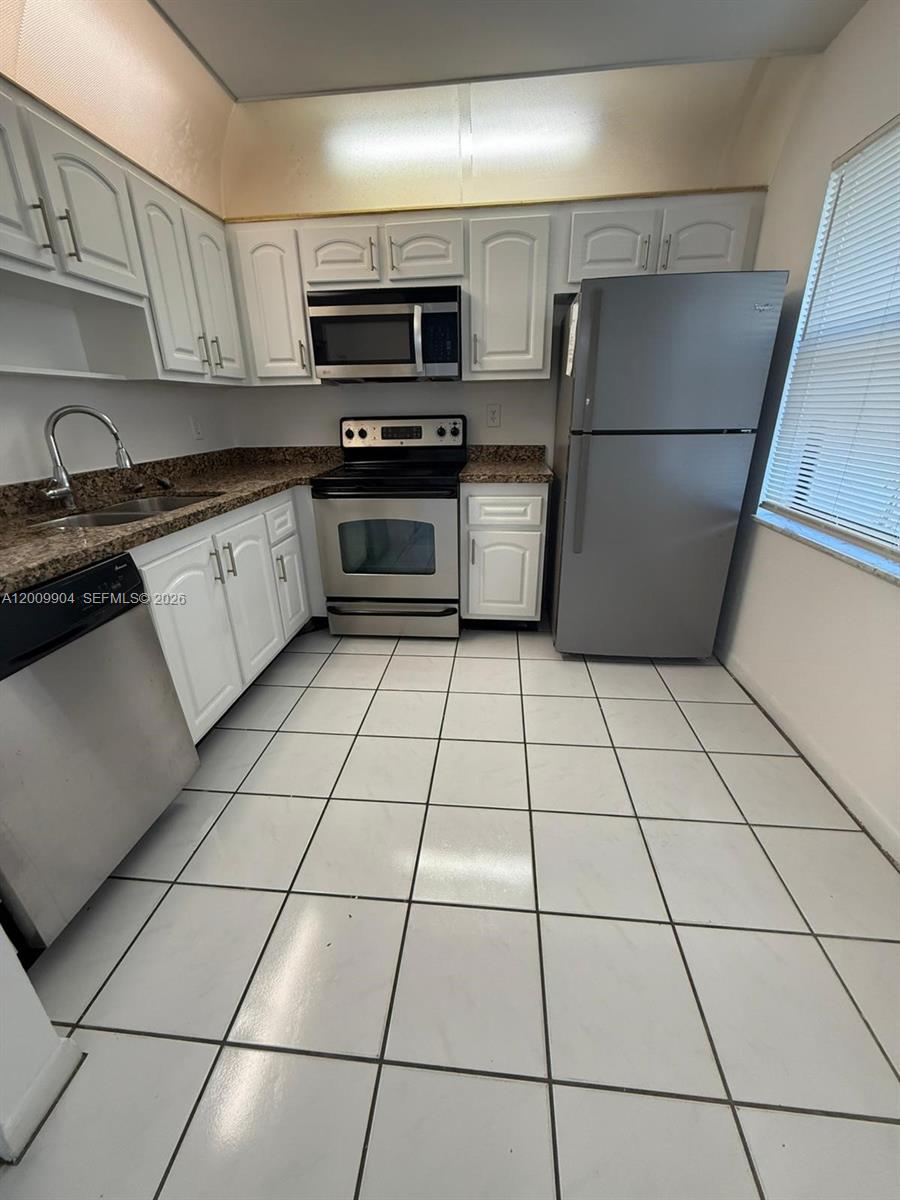 *more pics coming soon* Beautiful 4/2.5 townhouse in prestigious Delray Beach. Master downstairs with full bathroom and three bedroom upstairs. Walk in closets. Upgraded kitchen with granite counters and stainless steal appliances. Newer laminate floors and some title throughout. Large covered screened-in patio, and fenced-in backyard for privacy. Safe gated community with swimming pool, tennis and basketball courts, and playground. Spanish river high school near by. TENANT IN PLACE PAYING $2800 UNTIL JULY 31 2026. PROOF OF FUNDS AND ADVANCED SCHEDULED SHOWING REQUIRED.