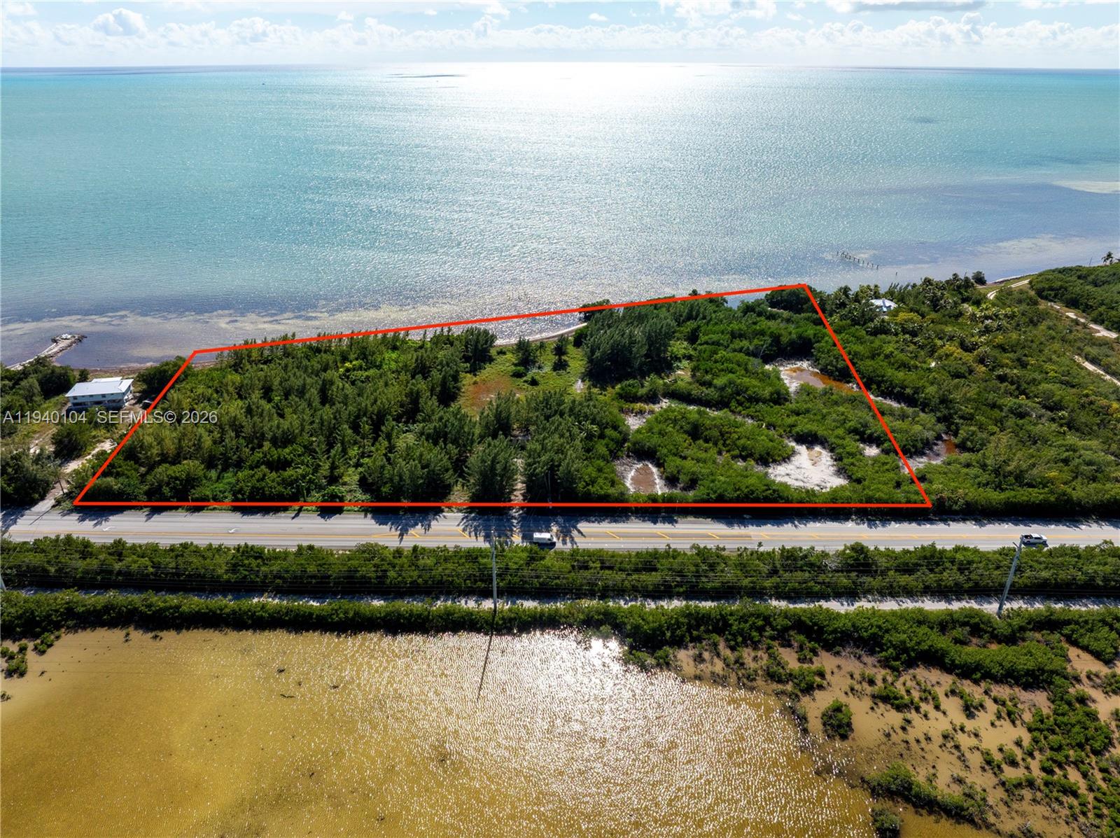 Rare oceanfront development opportunity in the heart of the Florida Keys.
Encompassing nearly 6 acres of pristine oceanfront land in Grassy Key, this exceptional parcel presents an ideal canvas for developers seeking to create luxury residential units with direct oceanfront and beach access.

Surrounded by unspoiled natural beauty and tranquil beaches, the property offers immediate proximity to shopping, fine dining, spas, marinas, and world-class boating. Residents will enjoy unparalleled access to deep-sea fishing, scuba diving, snorkeling, and vibrant coral reefs, all set against the backdrop of the Keys’ iconic turquoise waters.

Located in Marathon, often referred to as the Heart of the Florida Keys, the site benefits from a highly desirable central Keys location, conveniently positioned between the Upper Keys—such as Islamorada—and the Lower Keys, including Key West. Marathon is known for its rich maritime history, local airport, and accessibility, serving as a central hub comprising islands such as Vaca Key, Duck Key, and Grassy Key.

A truly rare offering combining scale, location, and oceanfront presence—an exceptional opportunity to develop a legacy project in one of Florida’s most coveted coastal destinations.
Please read the broker's remarks for detailed information on this offering.