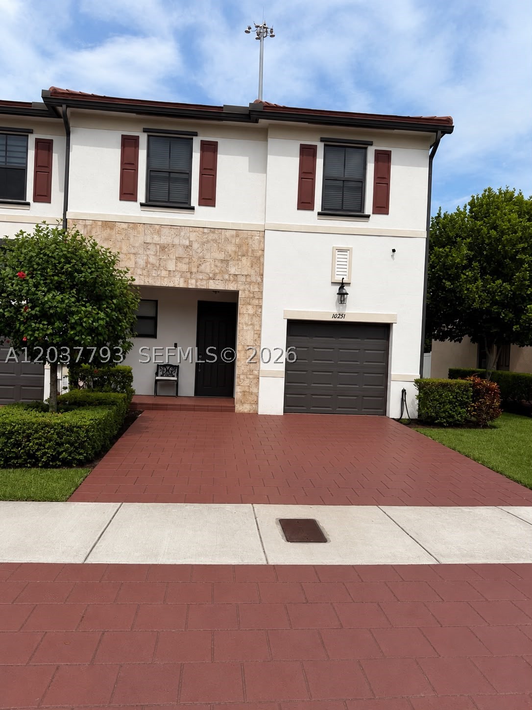 Welcome to Aquabella, one of Hialeah’s most desirable gated communities! This spacious and beautifully maintained townhome features 3 generously sized bedrooms and 2 full bathrooms upstairs, plus a convenient half bathroom on the first floor for guests. Enjoy a bright and functional layout designed for comfortable family living. Step outside to a covered backyard pergola, the perfect space for outdoor dining, entertaining, or relaxing year-round. Residents enjoy exclusive access to TWO resort-style pools, elegant clubhouses, fitness centers, playgrounds, and beautiful scenic views throughout the community. Ideally located near I-75, shopping, dining, and top-rated schools. Experience the best of South Florida living in this exceptional home!