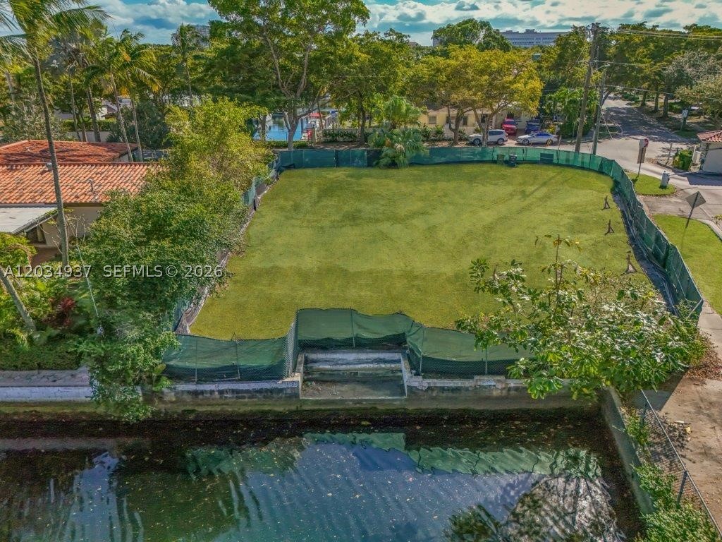 Create the Waterfront Estate You've Always Imagined. An extraordinary opportunity awaits in Keystone Point Islands—the only waterfront homesite currently available for immediate construction in this exclusive guard-gated enclave. Offering 85 feet of deep-water frontage on a generous 10,165 SF lot, this property provides unrestricted boating with no fixed bridges and effortless access to Biscayne Bay and the Atlantic Ocean via Haulover Inlet. Surrounded by multimillion-dollar residences and located moments from Bal Harbour, top-rated schools, luxury shopping, and renowned dining, this is the perfect setting for a custom waterfront masterpiece. Builder assistance, architectural plans, and multiple luxury floor-plan options are available to streamline your journey from vision to reality.