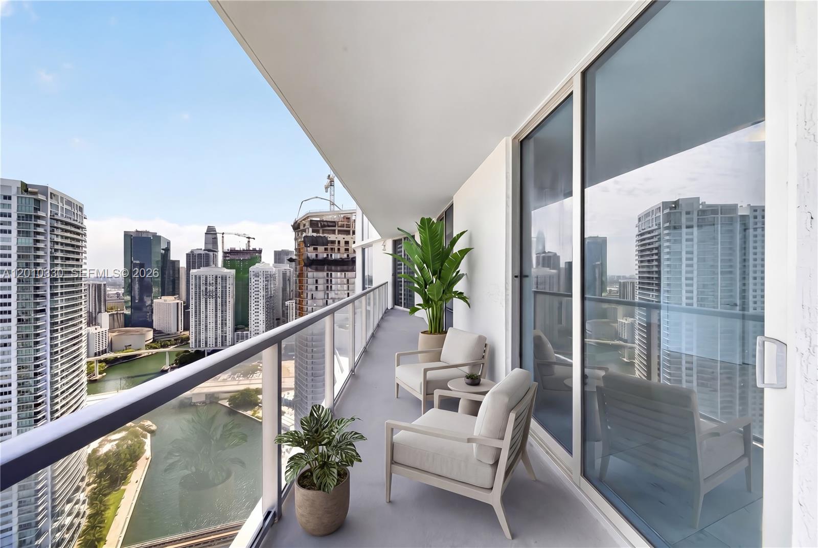 Lease to own option available! Experience elevated riverfront living at Latitude on the River, ideally positioned in the heart of Brickell. This sophisticated 2-bedroom, 2.5-bath residence showcases a bright, open-concept design with floor-to-ceiling glass and seamless indoor-outdoor flow. A spacious private terrace—accessible from every room—frames breathtaking views of the Miami River, skyline, and port.

Refined interiors feature generous living spaces, high ceilings, and a layout designed for both comfort and entertaining. Residents enjoy a full suite of amenities including a fitness center, a soon to be brand new pool, club lounge, and 24-hour concierge and valet services.

Perfectly located just steps from Brickell City Centre, world-class dining, and vibrant nightlife, with convenient access to I-95 and Miami International Airport. A rare opportunity to own in one of Miami’s most dynamic waterfront communities!