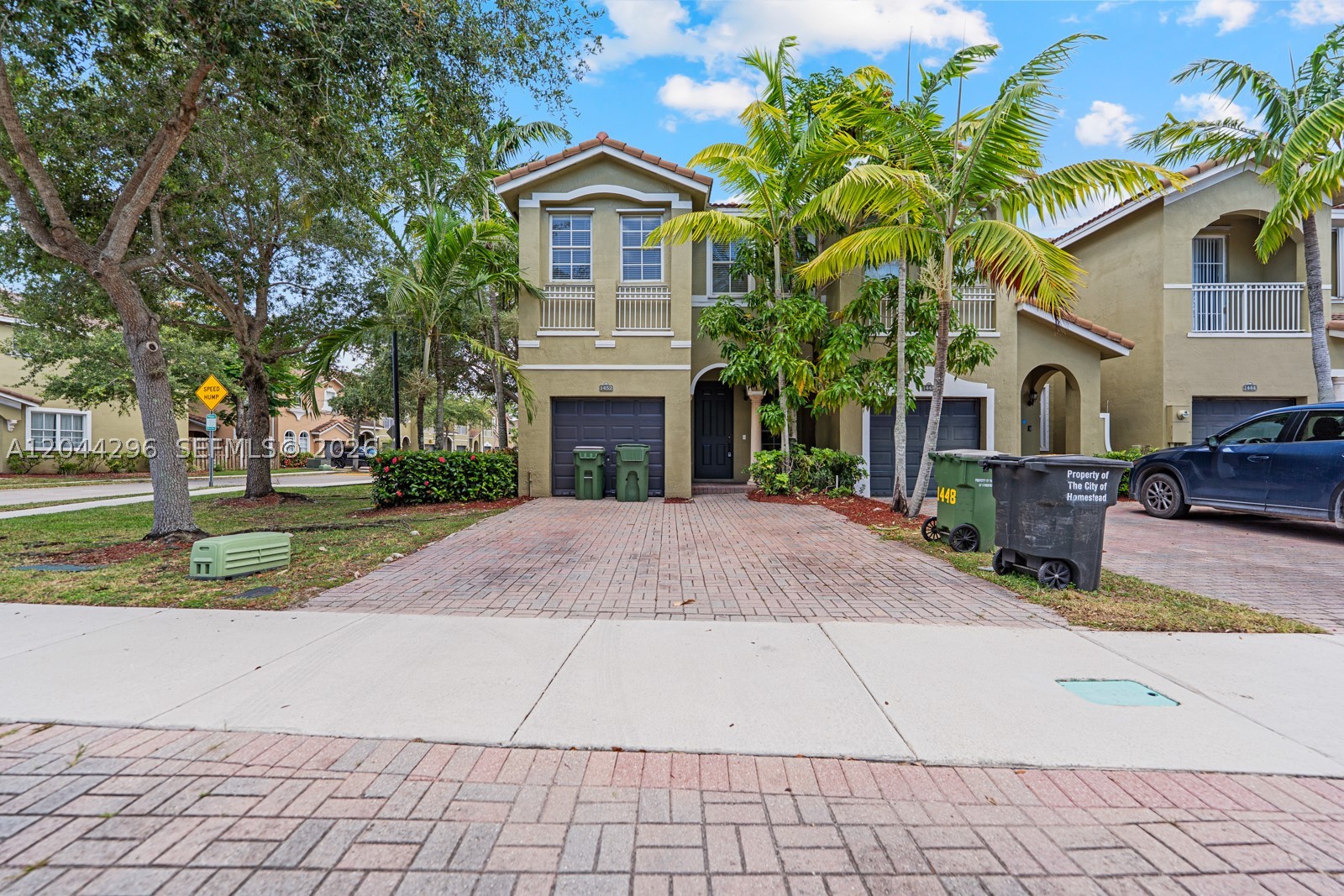 Spacious 4-Bedroom Corner Townhouse in Palm Breeze at Keys GateThis clean, move-in-ready 4-bedroom, 2.5-bathroom corner residence offers a functional layout with the spacious feel of a single-family home.

The main level features warm neutral tile flooring, clear architectural transitions, and a bright entryway anchored by a large arched window that maximizes natural light. An open living and dining area flows directly into the kitchen, which is configured with rich wood cabinets, dark countertops, a breakfast bar, and black appliances. Large sliding glass doors lead from the family room out to a private, fully fenced backyard.All four bedrooms are situated on the second level, providing privacy and flexible space for a growing family, guest rooms, or a dedicated home office.

Key Features:Corner Unit Advantage: Offers a larger footprint, added privacy, and extra windows for a brighter interior.Main-Level Essentials: Includes a convenient downstairs powder room and a separate laundry room with a washer and dryer.Low HOA Fees: Exceptional community value with monthly dues covering both cable TV and high-speed internet.  Guard-Gated Community: Located in a secure, well-maintained neighborhood with access to premium community amenities.Contact us to schedule a private walkthrough.