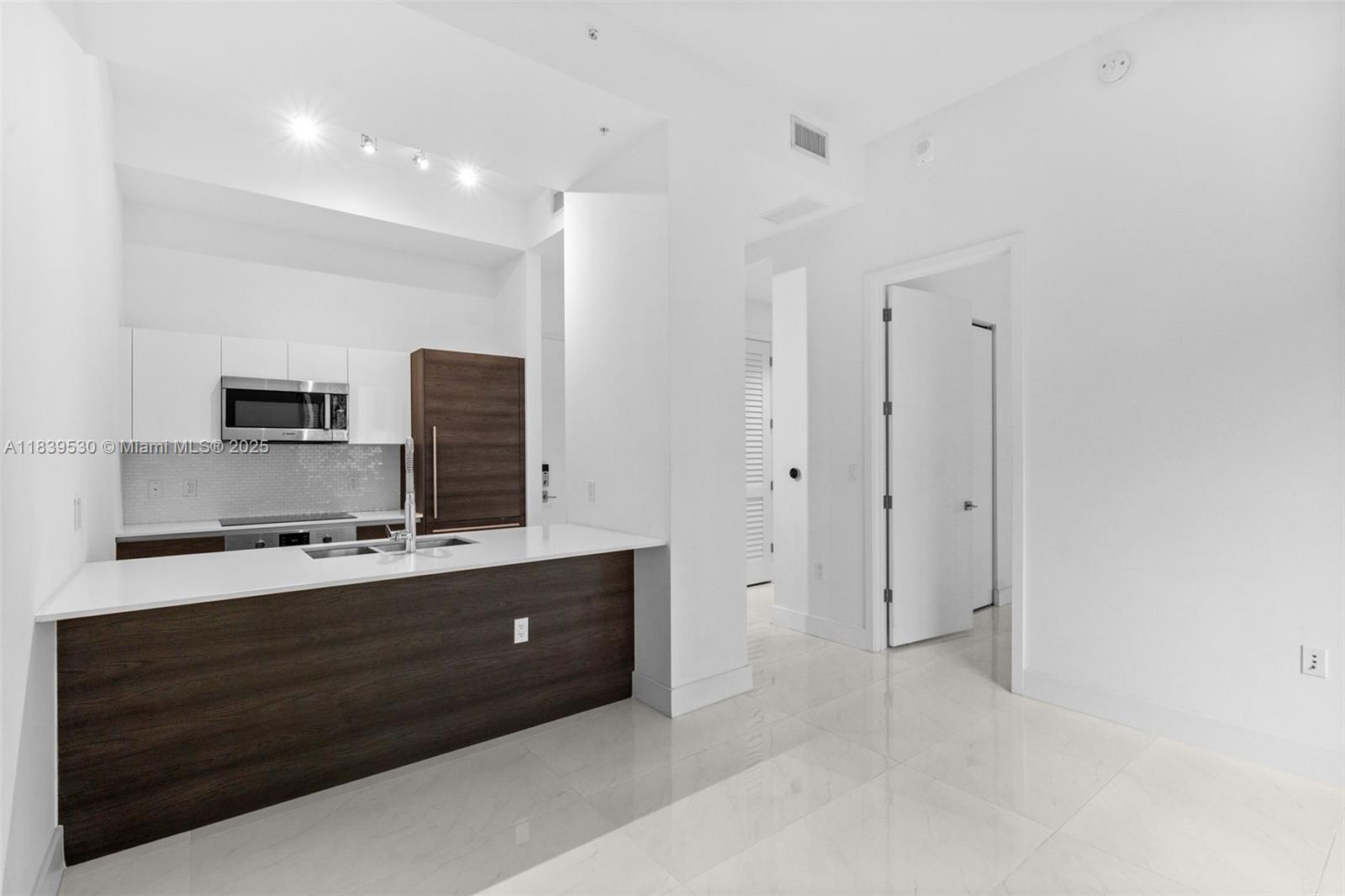 MERRICK MANOR CONDO - Residential Lease
