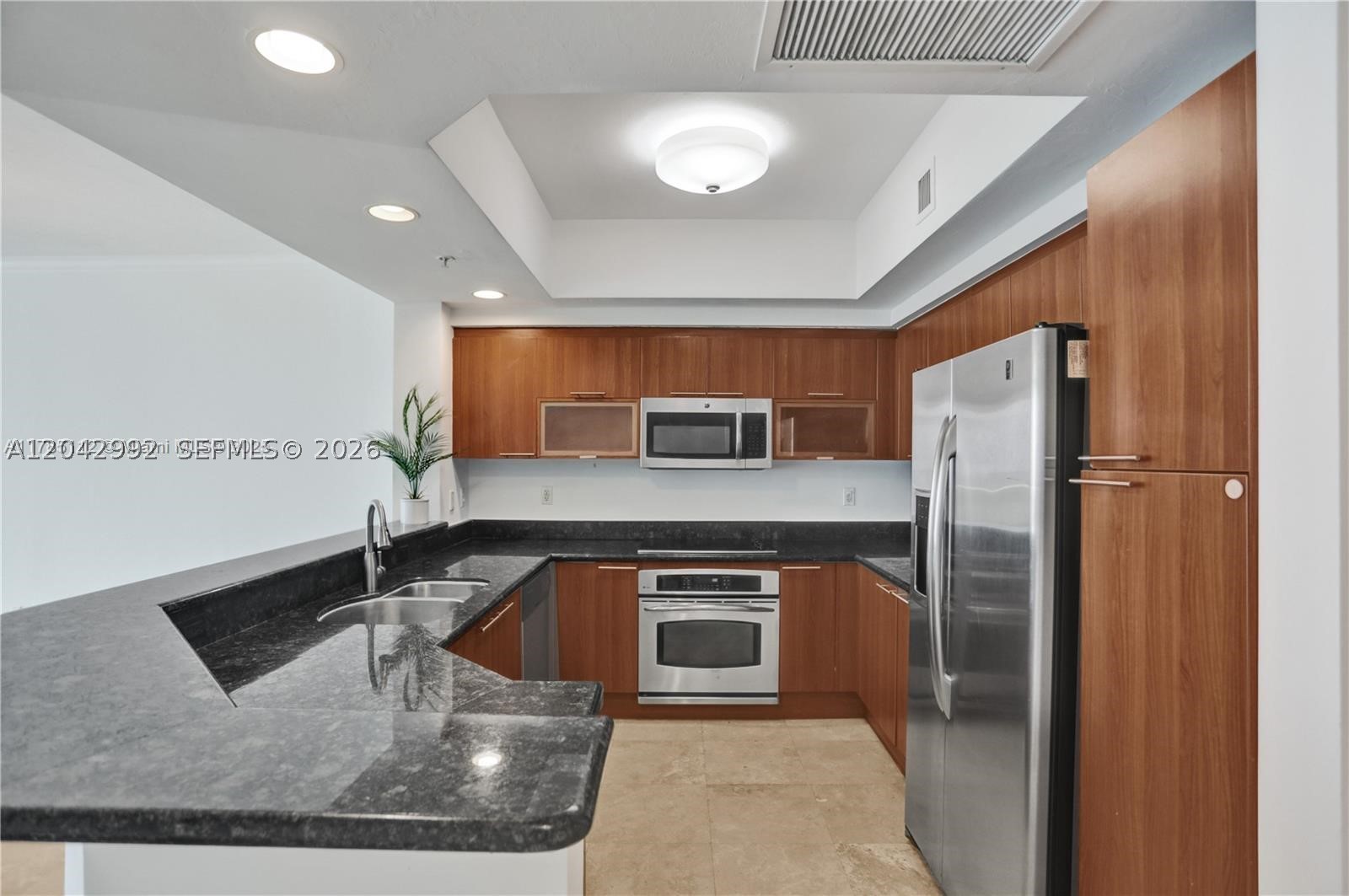 THE OAKS I CONDO - Residential Lease