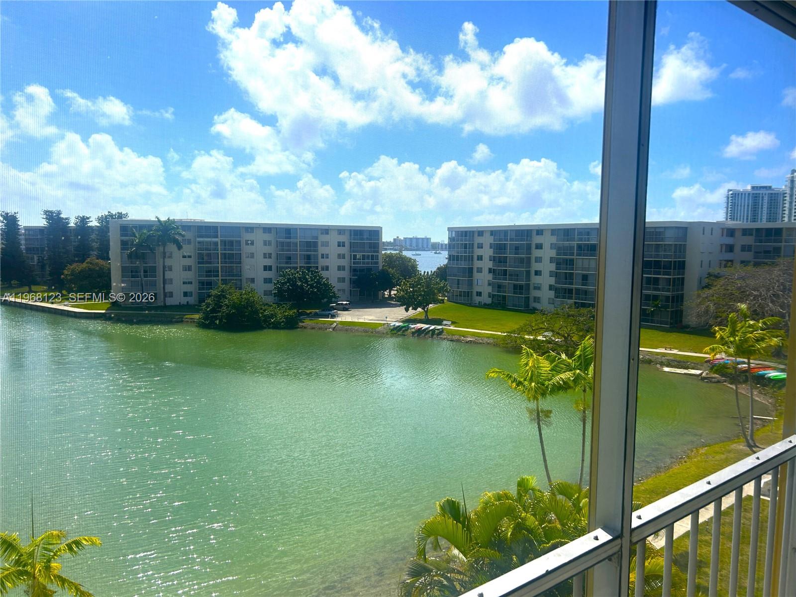 Enjoy amazing, breathtaking views from this beautiful 1-bedroom, 1-bath residence featuring an open kitchen with tile countertops, tile flooring throughout, and spacious closets. Bright and well-maintained, this unit offers comfort and functionality in a serene waterfront setting. Resort-style amenities include multiple pools, clubhouse, sauna, fitness center, bowling alley, billiards and card rooms, library, ping-pong, waterfront docks, and complimentary shuttle service. Ideally located on a peaceful island setting, just minutes from Aventura Mall, restaurants, cafes, banks, and everyday conveniences. A perfect blend of tranquility, lifestyle, and prime location. 55+