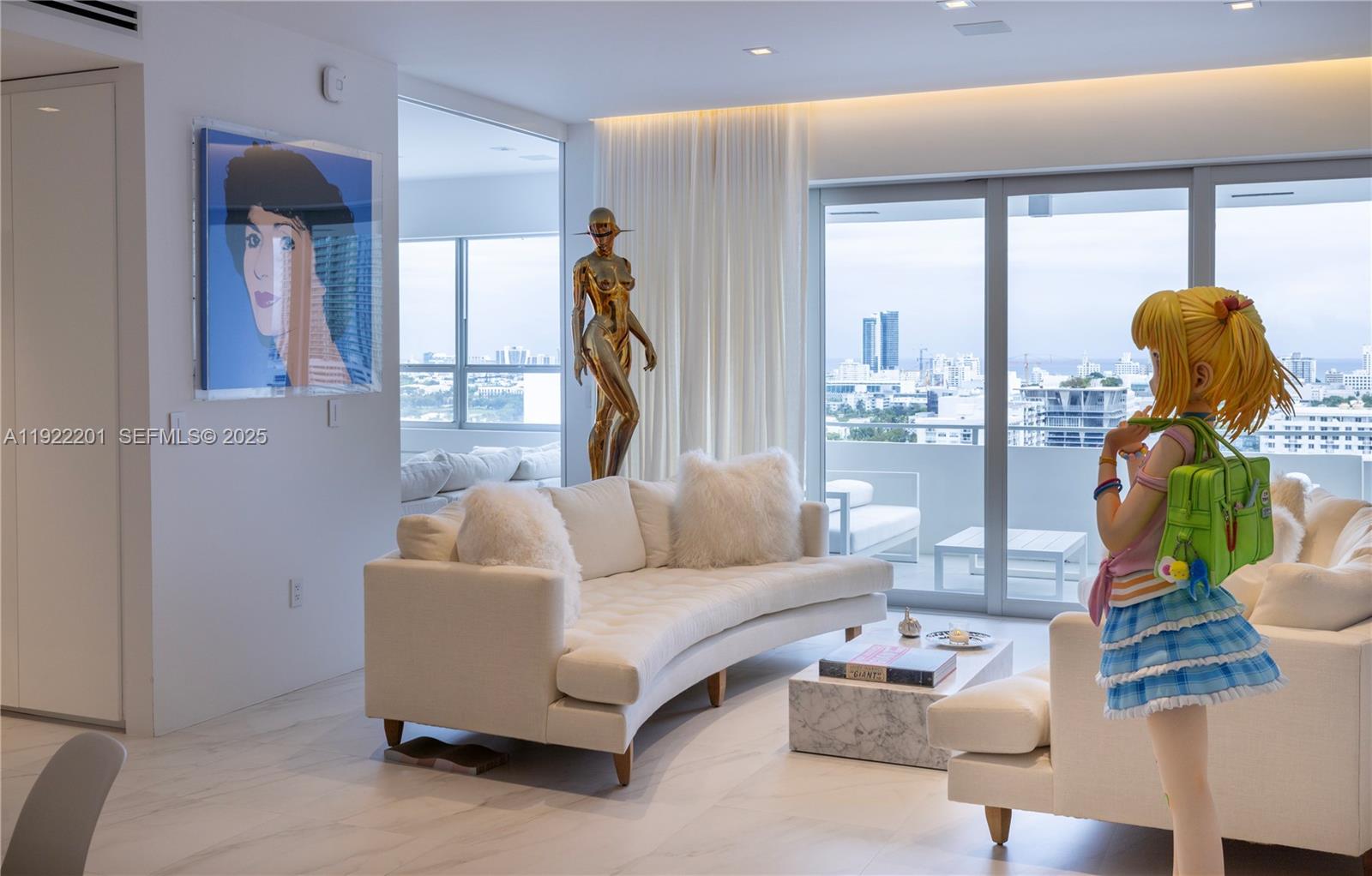 Presenting 11 Island Avenue, a Venetian Islands Legacy Property!  Magnificently appointed, this Penthouse home exemplifies refined living. From sunrises to sunsets encompassing city to bay plus ocean views, this home creates a magical space for tranquility, relaxation and entertaining. 

Completely renovated, the spaces include magnificent porcelain floors, an impeccable kitchen workspace, top of the line Bosch Appliances, lacquer cabinetry including a Dining Room wine bar, storage and serving spaces. Bedrooms and Bathrooms are appointed with ease of comfort and utility. W/D. Built in book case Murphy Bed unit in second living space with additional storage in each room and hallway. Surround sound system, state of the art lighting, electronic shades, impact windows, doors. Past Assessments paid up to date. One parking space. Close to all airports, sea ports, highways, shopping, markets, Houses of Worship, parks and paths. Use Showing Time or call listing agent. 24 hour notice requested. Easy to show.