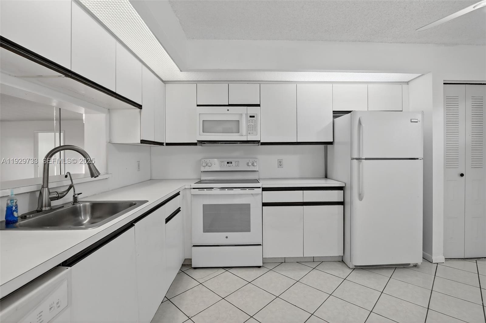Internet,Cable, and all amenties included in this 55 and over community Century Village. This 2 bedroom 2 bathroom located on the 3rd floor. Feel secluded and at peace with complete privacy. The building is located in a cul de sac. It is nestled near the well-known butterfly garden. Just walking distance from the satellite pools. The interior features are well matianed kitchen cabintets with an eat-in kitchen. A walk-in closet is located in the master bedroom. Ceiling fans located in both bedrooms and kitchen. Comfortable wood flooring is consistent throughout the entire condo. Equipped with a stackable washer and dryer. The patio allows you the luxury to enjoy the outdoors of  a scenic breathtaking panoramic western exposure view of the neatly manicured golf course. Just walking distance from the satellite pools. Resort-style living with a million-dollar clubhouse, movies, fitness center, transportation, free golf, pharmacy, cafe, 24-hour security patrol, and more.