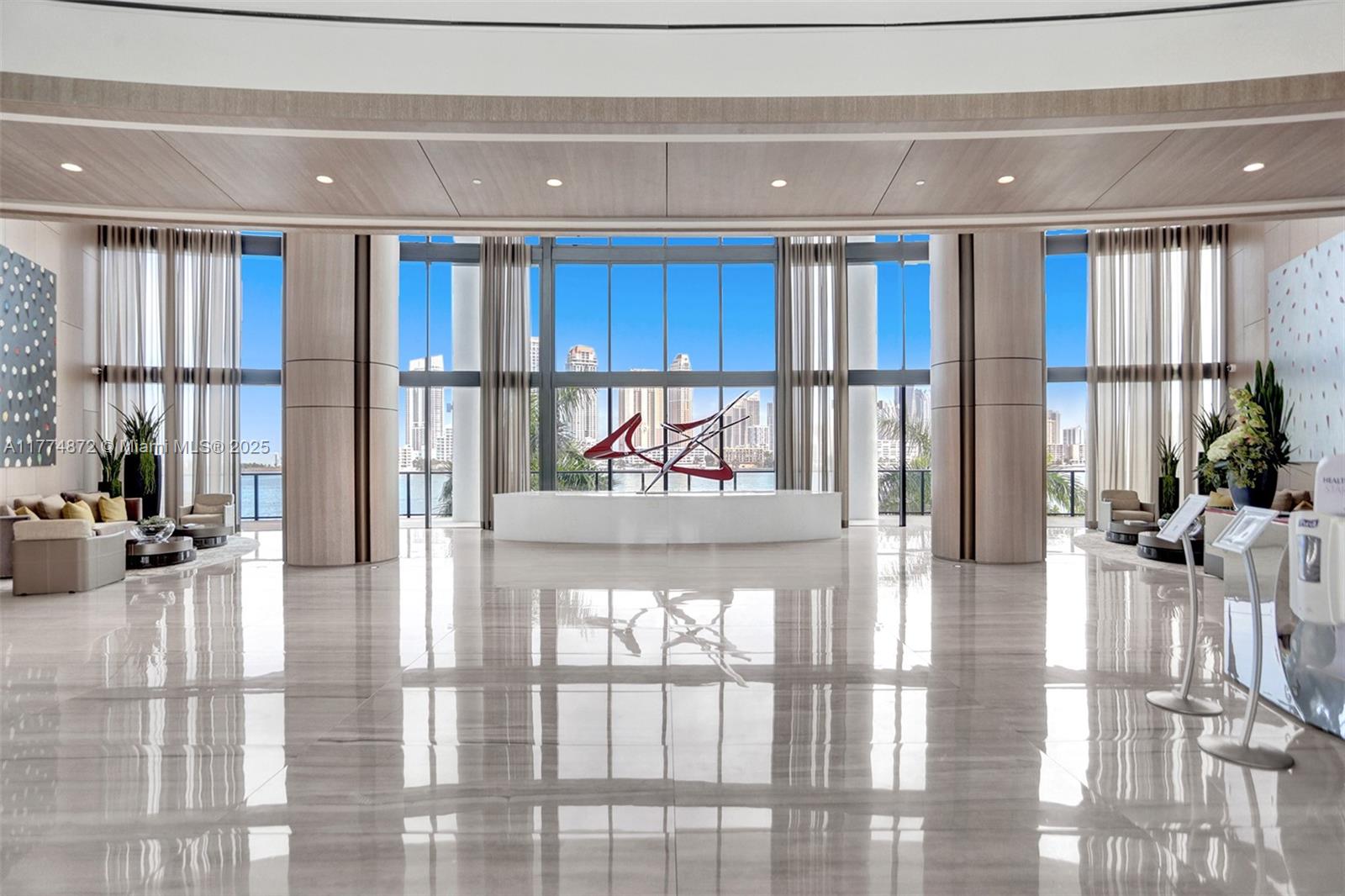 Stunning turn-key 7th floor condo that is a remix of Elegange, Luxury and Private living.Situated on an 8 acre private island in the Intracoastal Waterway,located at the epicenter of Aventura.Tastefully decorated.
Open living area w/10’+ ceilings high + european style kitchen equipped with Sub-Zero & Miele appliances a duet of style.Cruise feeling:Ocean to intracoastal views from all rooms,access to 2 spacious 10-foot-deep balconies with a summer kitchen; where you can have morning coffe as the sun rises over the ocean+sunset views from your 2nd terrace.Looking for peace and privacy?Look no more.Private Elevator to the unit. Building boasts an astounding array of lifestyle amenities like cigar lounge,private wine cellar,kids playground,Gym,Spa,tennis courts,full service pool 24h security.