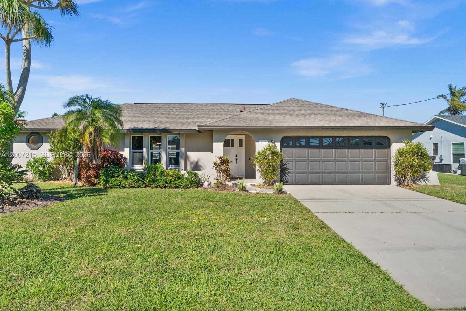 Experience Southwest Florida waterfront living in this beautifully REMODELED GULF ACCESS pool home featuring 80 FEET OF SEAWALL and direct boating access with only an approximately 20-minute boat ride to the river. Perfect for boaters, investors, or families looking for a waterfront home in a great neighborhood. This move-in ready home offers 3 spacious bedrooms, 2 beautifully updated bathrooms, quartz countertops, stainless steel appliances, tile flooring throughout, washer and dryer, and a 2-car garage. Step outside to your outdoor retreat featuring an in-ground pool, travertine pool deck, outdoor shower, and a pergola overlooking the canal — perfect for entertaining or enjoying the water views. Additional upgrades include a newer roof and updated features throughout. With a spacious layout, versatile area ideal for a coffee station or bar setup, and incredible outdoor living, this home delivers the Southwest Florida waterfront lifestyle. Schedule your private showing today!