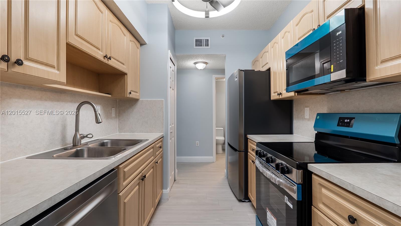 INCREDIBLE, freshly renovated and painted unit in highly desirable area next to prestigious NOVA SOUTHEASTERN University area in Davie! Investors Welcome. Rentable right away. Located  first floor in 3-story building in University Parc. Hot water tank 2022, AC replaced 2021, Washer & Dryer within the unit, New kitchen appliances. Split bedroom layout This unit offers convenience, comfort and luxury the same time. Situated just steps away from the community pool and easy access to the parking lot. Additional spacious separate storage room next to unit. Unit is vacant, easy to show and ready for quick closing and move in.