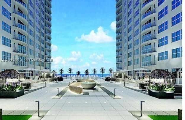 Experience spectacular direct FRONT oceanview SOUTHEAST CORNER UNIT !!!!!!
 living on Galt Ocean Mile!  luxury with breathtaking ocean, beach, and city views. Features include a desirable huge floor plan with 2 huge bedrroms and can be converted to 3 bedrooms and 3 full bath, convenient inside washer/dryer.
Southpoint provides resort-style living with deeded beach access, a fitness center, and tennis courts.  the 40-year inspection and restoration work are fully completed, and ALL ASSESSMENTS ARE PAID by the seller! Includes 2 assigned underground parking space. Pet friendly for 1 pet up to 35lbs. Don't miss this beachfront masterpiece!