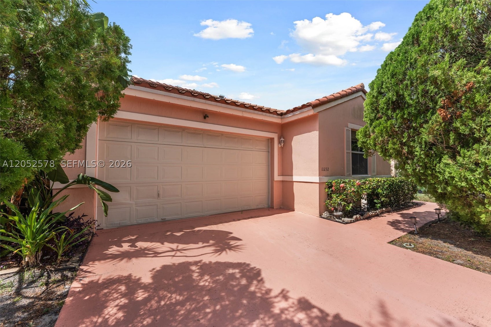 BRAND NEW ROOF. Welcome to this well-maintained 3-bedroom, 2-bath single-family home in the desirable Genesis at The Landings community in Pembroke Pines. This one-story residence offers 1,710 sq ft of living space with an open and functional layout featuring volume ceilings, a foyer entry, tile flooring throughout, and a spacious eat-in kitchen with snack bar. The primary suite includes a walk-in closet and ensuite bath with separate shower and tub. Enjoy a fenced backyard with fruit trees, an attached 2 car garage. Conveniently located near schools, shopping, dining, and major highways. Low monthly HOA. PRICED TO SELL NOW