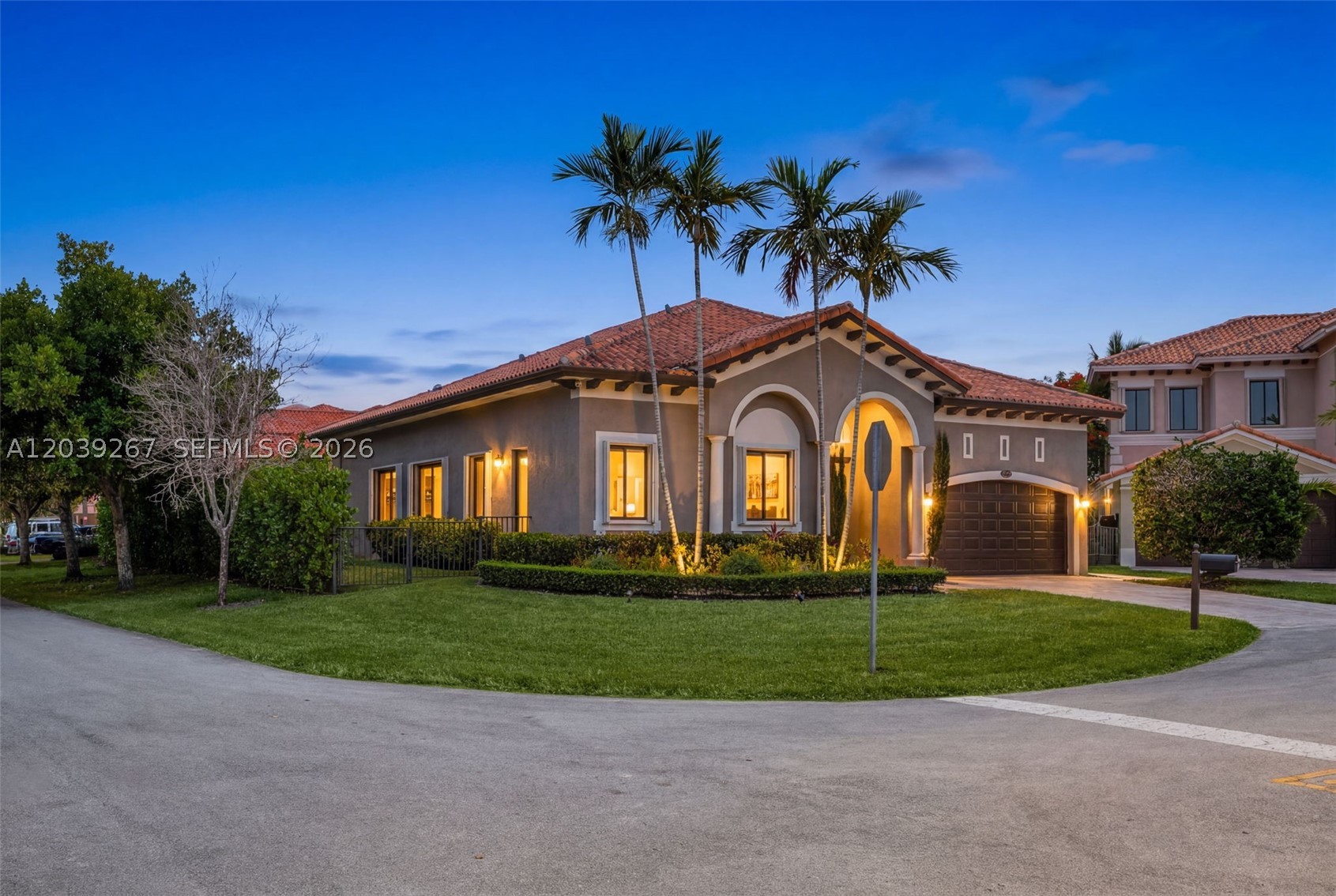 Experience the perfect blend of luxury, comfort, and effortless entertaining in this exceptional residence. Soaring 15-foot ceilings and over 3,263 square feet of thoughtfully designed living space create an atmosphere of elegance and warmth. The heart of the home is a spectacular chef's kitchen featuring two oversized islands, a sunny breakfast nook, and seamless flow into expansive living spaces designed for gathering. A formal dining room adds timeless sophistication, while the private bedroom layout offers space for everyone. Step outside to your own resort-style retreat with a fully equipped outdoor kitchen, quartz countertops, a stunning waterfall peninsula, and a secluded backyard on a desirable corner lot. Complete with a Jack-and-Jill cabana bath, two-car garage, and FPL EV charger, this home offers the lifestyle you've been waiting for.