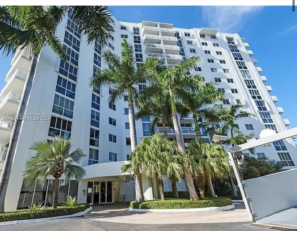 Beautiful first-floor 2BR, 2BA in a full-service building with 24-hour doorman, on-site management, pool and gym.  Includes 1 assigned parking space.  Prime location directly across from Trade Joe's and just minutes to Whole Foods, Sunset Harbour, the Venetian Causeway, dining, shopping and  more.  Some photos virtually staged.