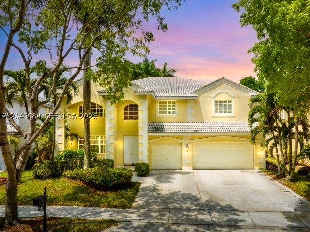 Exceptional value for this stunning home located in the highly desirable community of The Ridges! Offering 5 bedrooms, 4 bathrooms and  3-car garage, this meticulously maintained residence is situated on a large, private lot. The spacious, functional floor plan features an updated chef's kitchen, beautiful tile flooring throughout the main living areas on the first floor, and rich Brazilian cherry hardwood flooring upstairs. The primary suite is a true retreat, complete with a sitting area, an updated spa-inspired bathroom, and a versatile flex room ideal for a home office, nursery, or fitness space. The expansive backyard provides plenty of room for relaxing, or entertaining while enjoying the Florida lifestyle. Outstanding community amenities, includes a resort-style pool, toddler pool, BBQ areas, basketball and soccer courts, playgrounds, and scenic walking paths. Located within top-notch school district, this home offers the perfect combination of luxury, comfort, and an exceptional lifestyle.