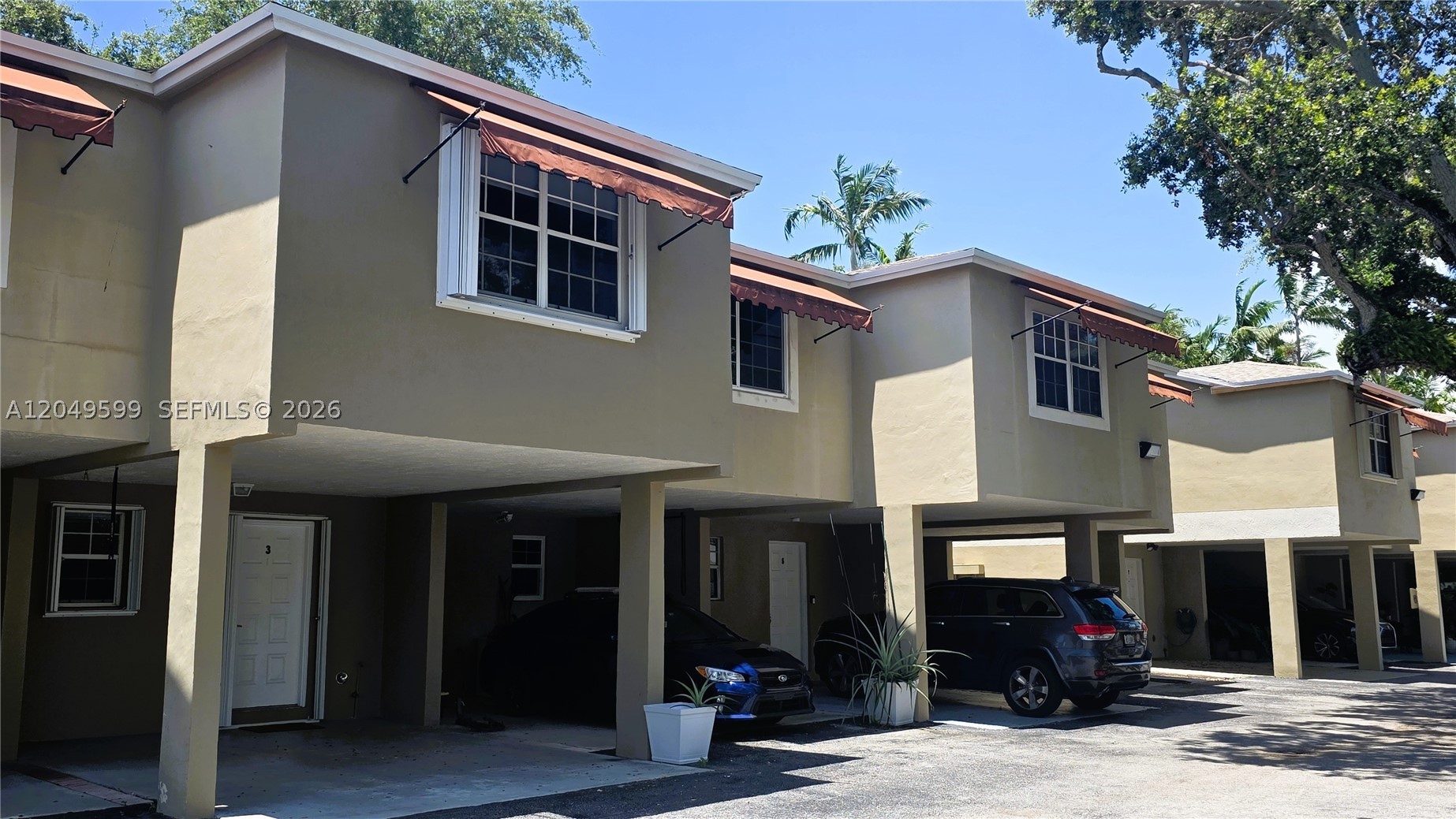 Beautifully updated 2 bedroom, 2.5 bath townhouse located in the heart of the highly desirable and prestigious Coconut Grove. Nestled within a private gated community with only a few residences, this home offers privacy and comfort. Features include a spacious primary suite with a private balcony, in-unit laundry, a covered carport, and a cozy private patio. Ample guest parking is available. Conveniently located just minutes from US-1, providing easy access to shopping, dining, entertainment, and transportation. Easy to show this is a home you'll love!