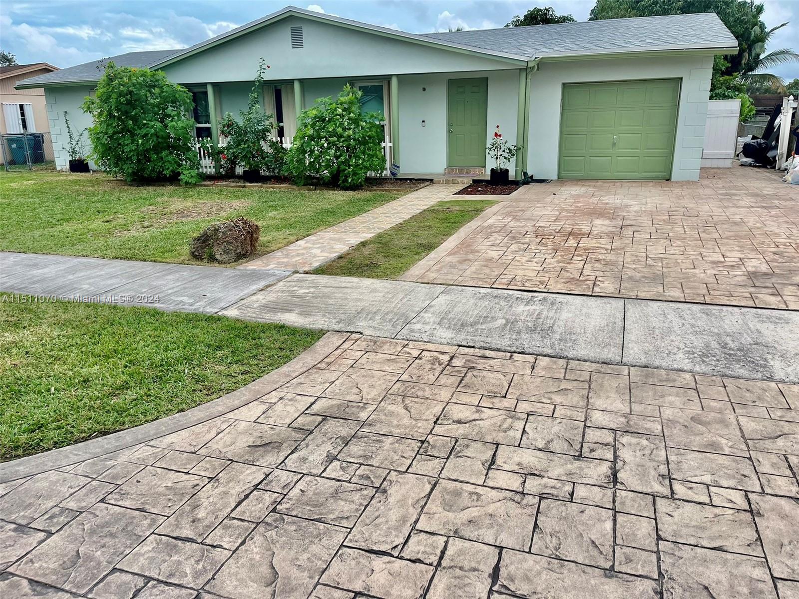 Single family home in the sought after area of Palmetto States with 4 bedrooms, 2 bathrooms and a completely remodeled kitchen with an incredible view of the yard that allows you to watch your children while they play or swim in the pool. The property has just gone through a complete renovation with a new kitchen and stainless steel appliances, all walls were painted, new laminate flooring and new ceiling. There is plenty of storage in the garage and two sheds in the backyard.