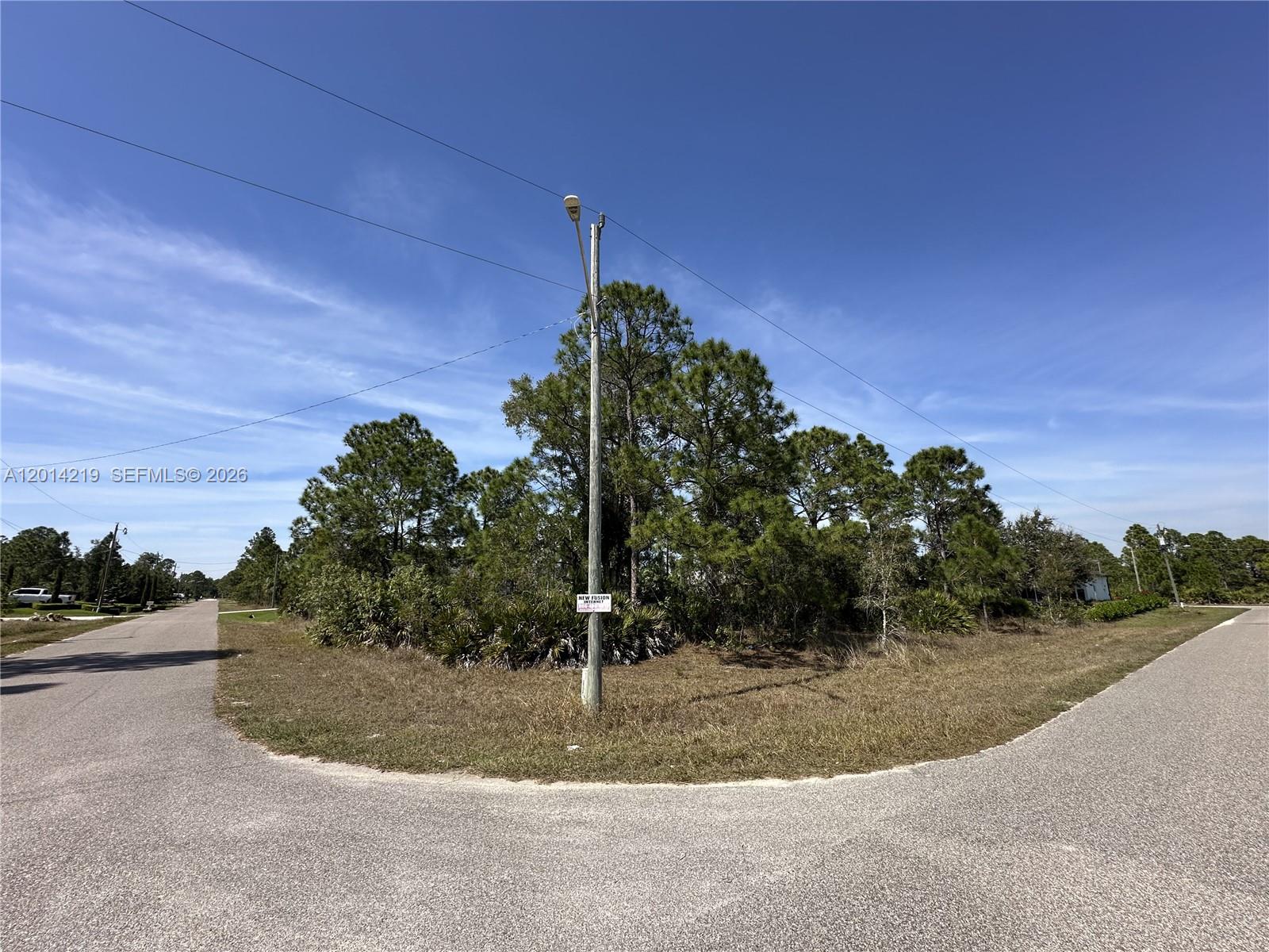 Prime 0.25-acres residential lot in the heart of Lehigh Acres, FL. A fast-growing area ideal for builders, investors, or future homeowners. This nearly cleared corner lot offers the perfect foundation for your next construction. Located in a quiet yet well-connected neighborhood, the property combines peaceful suburban living with proximity to shopping, dining, schools, and major roadways. Whether you're envisioning a cozy single-family home or a custom-designed retreat, this spacious parcel provides the flexibility to bring your vision to life. Surrounded by new development and with no flood zone, this lot is a smart investment in one of Southwest Florida's most promising communities.