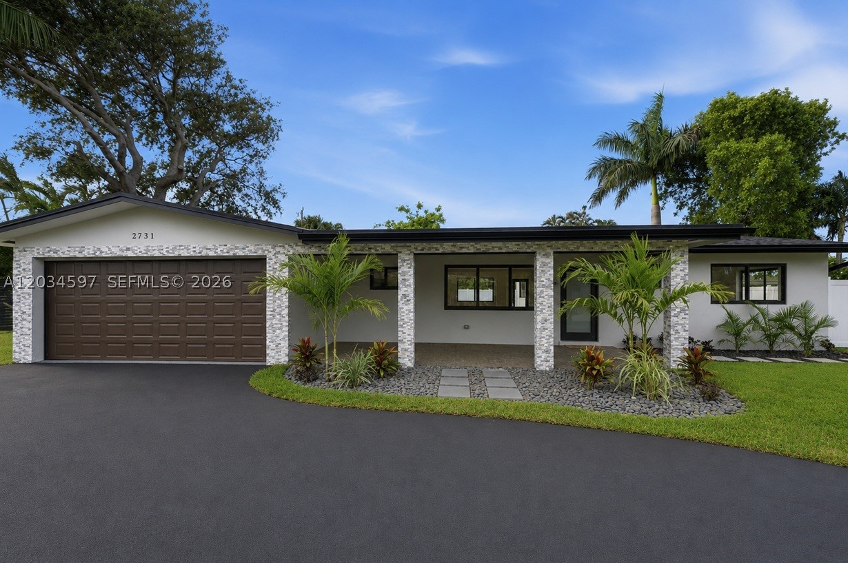 Beautifully renovated 3-bedroom, 2-bath home in the highly desirable Lighthouse Point community. This move-in-ready residence showcases quality upgrades throughout, including a NEW 2026 roof, updated electrical system, impact windows and doors, new attic insulation, and a new sprinkler system on well water. The bright and open floor plan is enhanced by abundant natural light and modern finishes, creating a welcoming atmosphere for everyday living and entertaining.

The updated kitchen features new appliances, while the home also includes a new washer and dryer for added convenience. The spacious primary suite and generously sized guest bedrooms provide comfort and flexibility. An oversized two-car garage boasts a new garage door and durable epoxy flooring, offering plenty of space for vehicles, storage, or a workshop.

Step outside to a generously sized backyard with ample room to add a pool and create your own private outdoor oasis. Conveniently located near beaches, marinas, shopping, dining, and all that Lighthouse Point has to offer, this exceptional home combines modern upgrades, functionality, and South Florida living at its finest.