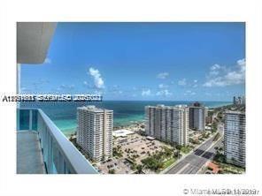 Stunning 2-bed, 2 and 1/2 bathroom residence in a luxury  building, just steps from the beach. Floor to ceiling impact windows and doors with breathtaking views of the ocean , Intracoastal and the city. Split bedroom layout , Euro Style kitchen, marble floors. Large balcony. Resort style amenities. Garage parking (second space available for $100/month)