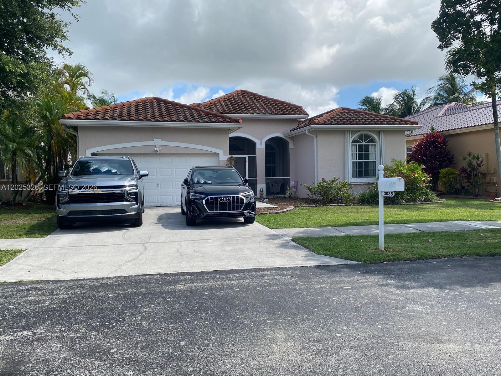 Stunning 4-bedroom, 3 full-bath home located in the East Lake community in Homestead! Enjoy breathtaking lake views from your covered and screened patio, perfect for relaxing or entertaining. This beautiful home features a completely remodeled kitchen with brand-new cabinetry, stainless steel appliances, and modern finishes. The spacious split floor plan offers plenty of living space, including one bedroom and full bath privately separated from the others — ideal for guests, in-laws, or older children. Freshly painted in 2025, with a new roof installed in 2020 and A/C replaced in 2018.