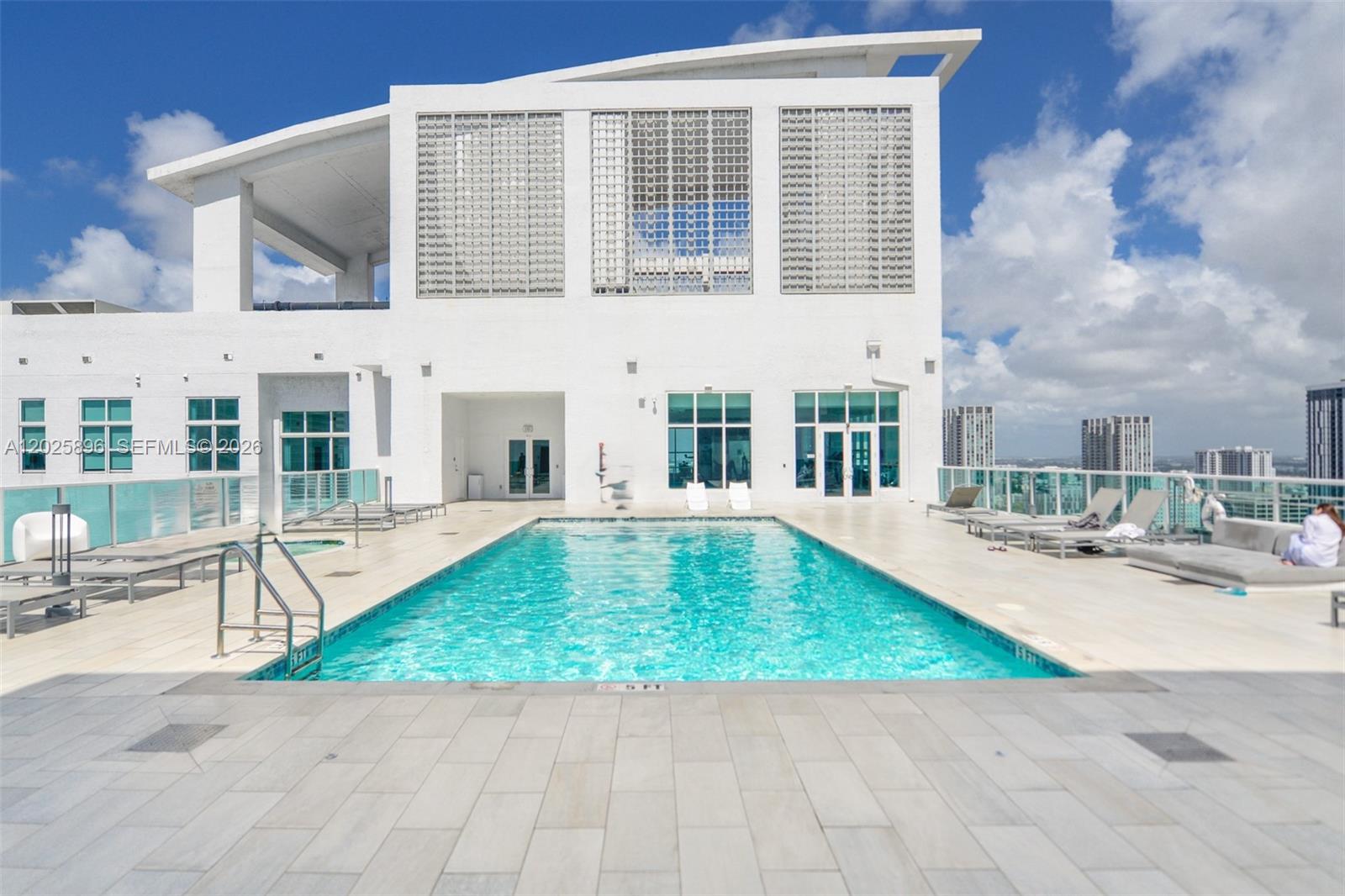 Experience elevated urban living in this stunning 2BD/2BA residence in the heart of Downtown Miami. Featuring soaring 10-ft ceilings, impact windows, polished concrete floors, stainless-steel appliances, in-unit washer/dryer, and a private balcony with breathtaking city views. Enjoy resort-style amenities including a rooftop pool with panoramic skyline views, lap pool, spa, state-of-the-art fitness center, club room, 24-hour concierge, and security. Unbeatable location just steps from Brickell City Centre, Bayside, Brightline, Kaseya Center, Bayfront Park, MetroMover, premier dining, shopping, and entertainment. Minutes from Midtown, Wynwood, and South Beach. Investor-friendly building allows rentals up to 12 times per year with a 30-day minimum. Convenient parking available across the street for only $65/month. Additional parking available. Pet-friendly: up to 2 pets, 30 lbs each (larger pets subject to condo approval).