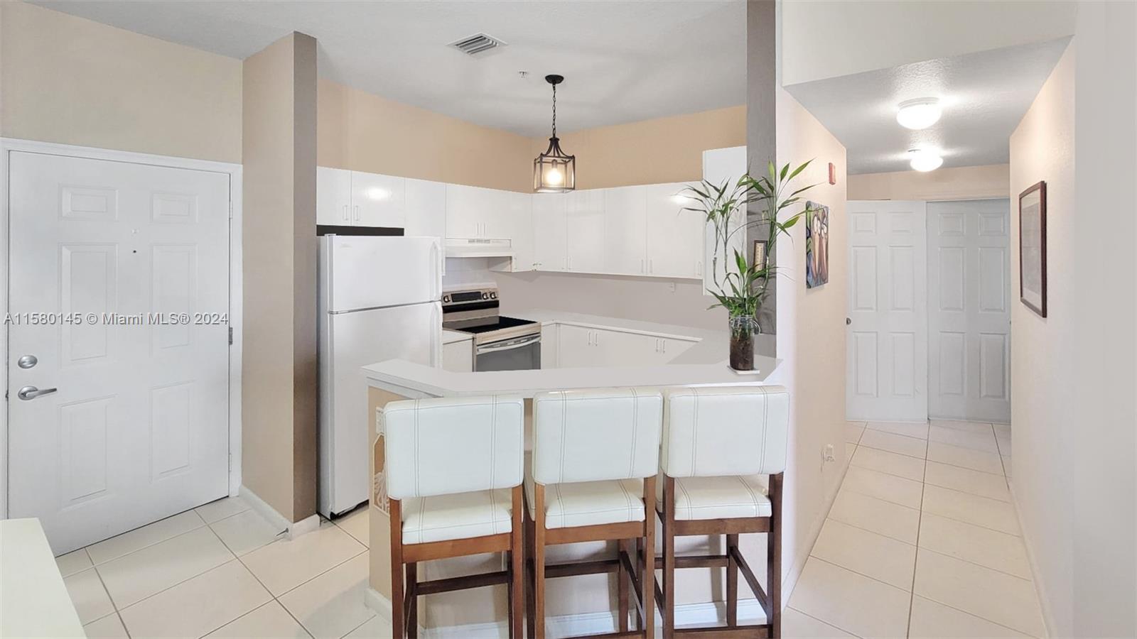 This well-maintained, spacious 2 bed/2 bath corner unit is a true gem in the beautiful Sea Oak community with no age restrictions. Perfect for 1st time buyers or as a second home in Sunny Florida. Features include: Huge balcony with glass sliding doors from living room, master bedroom, and guest bedroom! MUST SEE! Soaring 11 ft ceilings throughout! Spacious master bedroom can operate as its own unit with a mini kitchen, and extra refrigerator and its own private/exit! 
Building has new roof. Unit has A/C as of March 2021. Secure building in well-maintained community
Prime location just over 1 mile from the beach and close to airport
Near new Dania Pointe shopping center with restaurants, shopping, and hotels. Won't last! Appraised unit by the seller, asking less. Ready to move in.