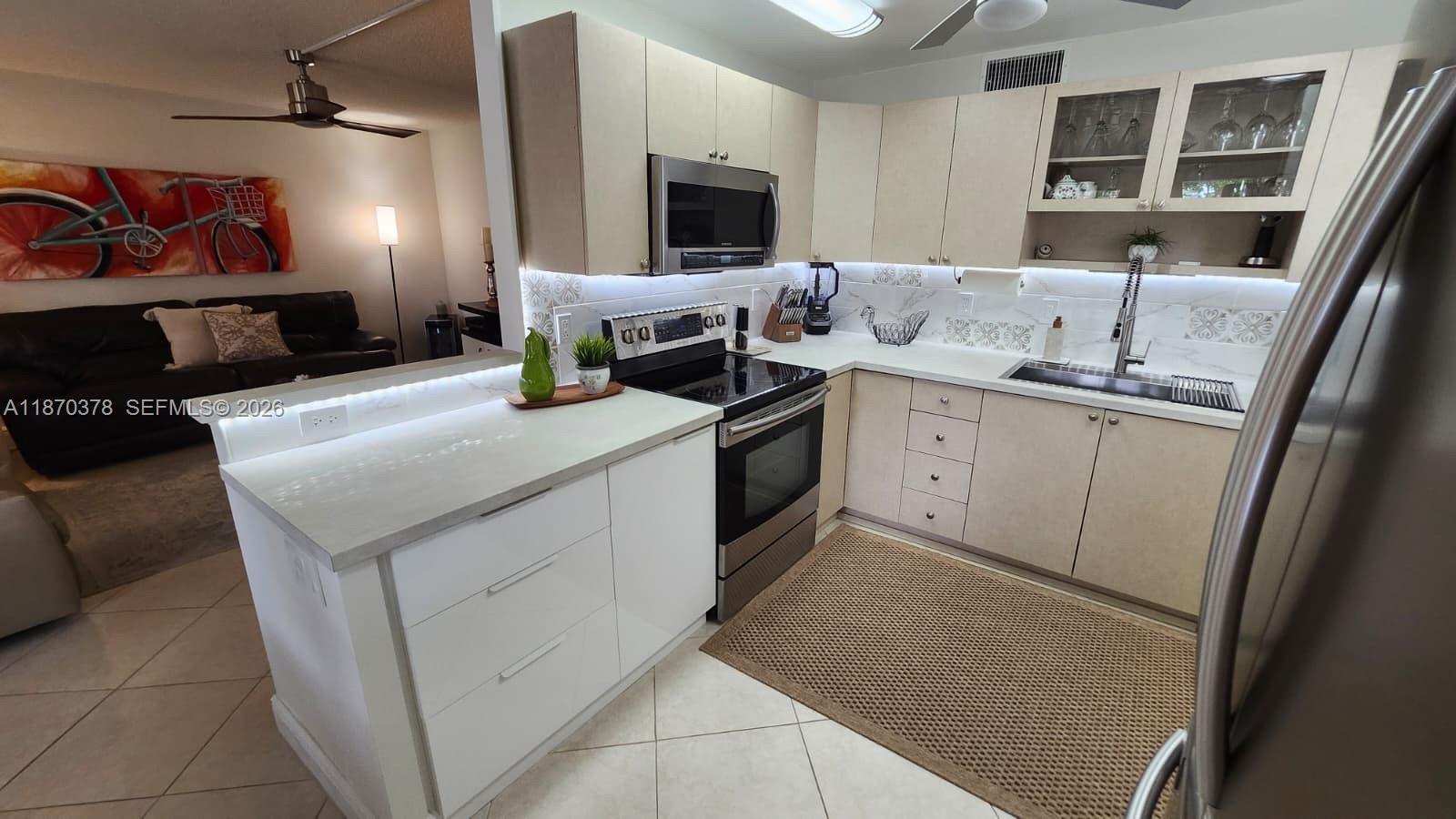 Welcome to this stunning Fully Furnished Turn Key 2 bedroom, 2 bathroom corner unit condo Beautifully renovated to perfection The corner unit with is bathed in natural light, creating a warm and inviting atmosphere perfect for relaxing and entertaining. Enjoy the serene greenery and vibrant scenery from the comfort the spacious Florida room! ENJOY CENTURY VILLAGE ACTIVE 55+ RESORT STYLE LIVING. OFFERS MANY ACTIVITIES & ACTIVITIES INCLUDING A LOCAL BUS SERVICE, CLUBHOUSE, TENNIS, BILLIARD ROOM, ART CLASSES, GYM, & MUCH MORE. LOCATED MINUTES TO THE BEACH , RESTAURANTS & SHOPPING. WELCOME TO SOUTH FLORIDA LIVING! MUST SEE!ENJOY CENTURY VILLAGE ACTIVE 55+ RESORT STYLE LIVING. OFFERS MANY ACTIVITIES INCLUDING A LOCAL BUS SERVICE, CLUBHOUSE, TENNIS, BILLIARD ROOM, ART CLASSES, GYM, & MUCH MORE.