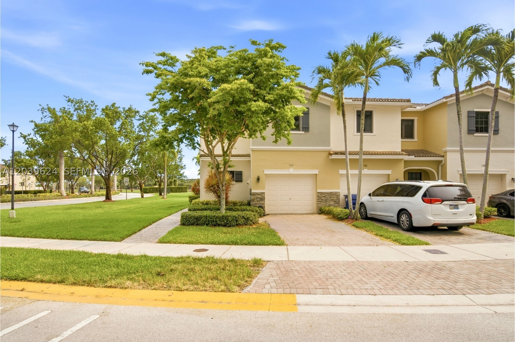 Stunning and highly sought-after, this 3-bed, 2.5-bath townhouse is located in the prestigious, family-friendly community of Aventura Isles. The property features a 1-car garage plus 2 additional driveway parking spaces, full hurricane protection with all high-impact windows and doors, and an open, inviting layout. With ceramic tile flooring throughout the main living areas, brand-new carpet on the stairs, stainless steel appliances that are approximately 3 years old, and a whole-home saltwater filtration system also installed about 3 years ago, the home is move-in ready and exceptionally well maintained. All bedrooms are conveniently situated on the second floor, while a half bath is located downstairs. The oversized backyard offers plenty of open green space for entertaining, relaxing, and outdoor activities. Ideally located near the guard-gated entrance, this home provides quick and convenient access in and out of the community. Easy To Show!