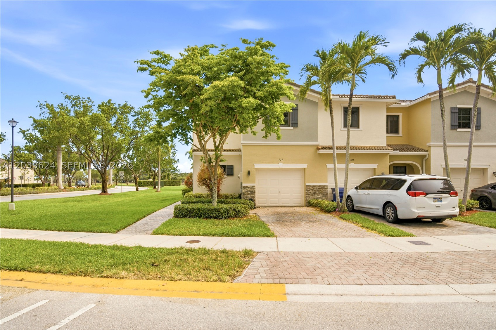 Stunning and highly sought-after, this 3-bed, 2.5-bath townhouse is located in the prestigious, family-friendly community of Aventura Isles. The property features a 1-car garage plus 2 additional driveway parking spaces, full hurricane protection with all high-impact windows and doors, and an open, inviting layout. With ceramic tile flooring throughout the main living areas, brand-new carpet on the stairs, stainless steel appliances that are approximately 3 years old, and a whole-home saltwater filtration system also installed about 3 years ago, the home is move-in ready and exceptionally well maintained. All bedrooms are conveniently situated on the second floor, while a half bath is located downstairs. The oversized backyard offers plenty of open green space for entertaining, relaxing, and outdoor activities. Ideally located near the guard-gated entrance, this home provides quick and convenient access in and out of the community. Easy To Show!