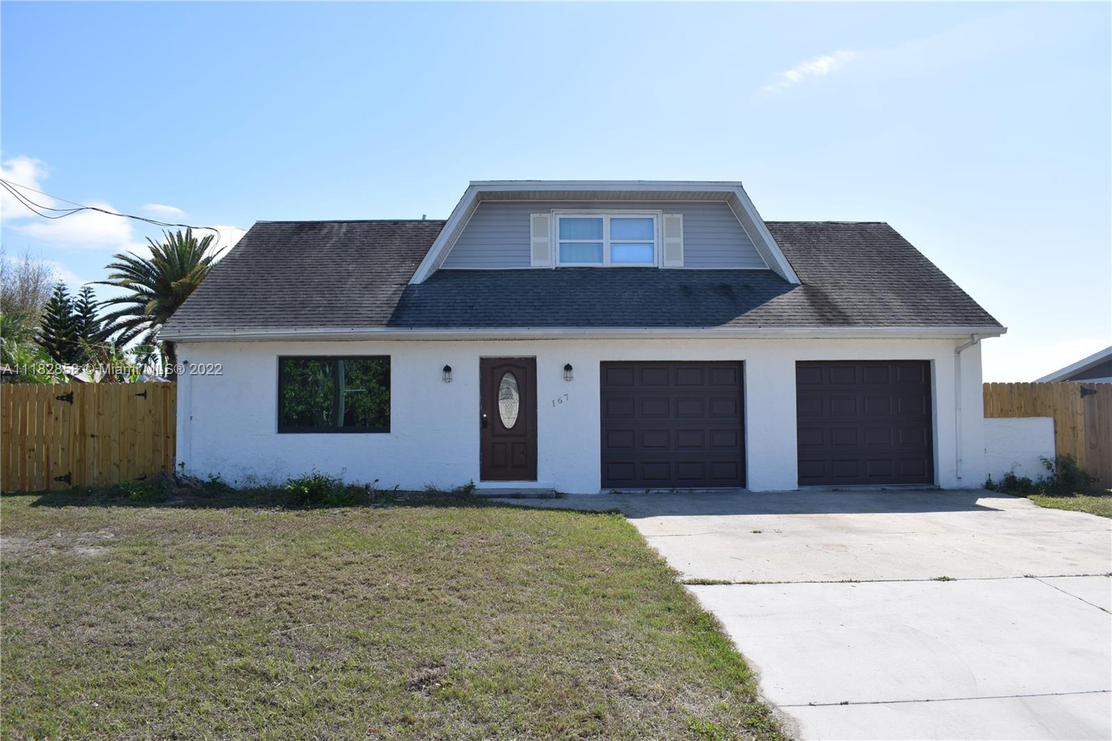 Waterfront property with  short drive to open water, 3/2 , 2 car garage, 2159 sf of living area 3099sf total area, amazing views from the second floor,  close to  the local beach and boat ramp ,nice and quiet  neighborhood