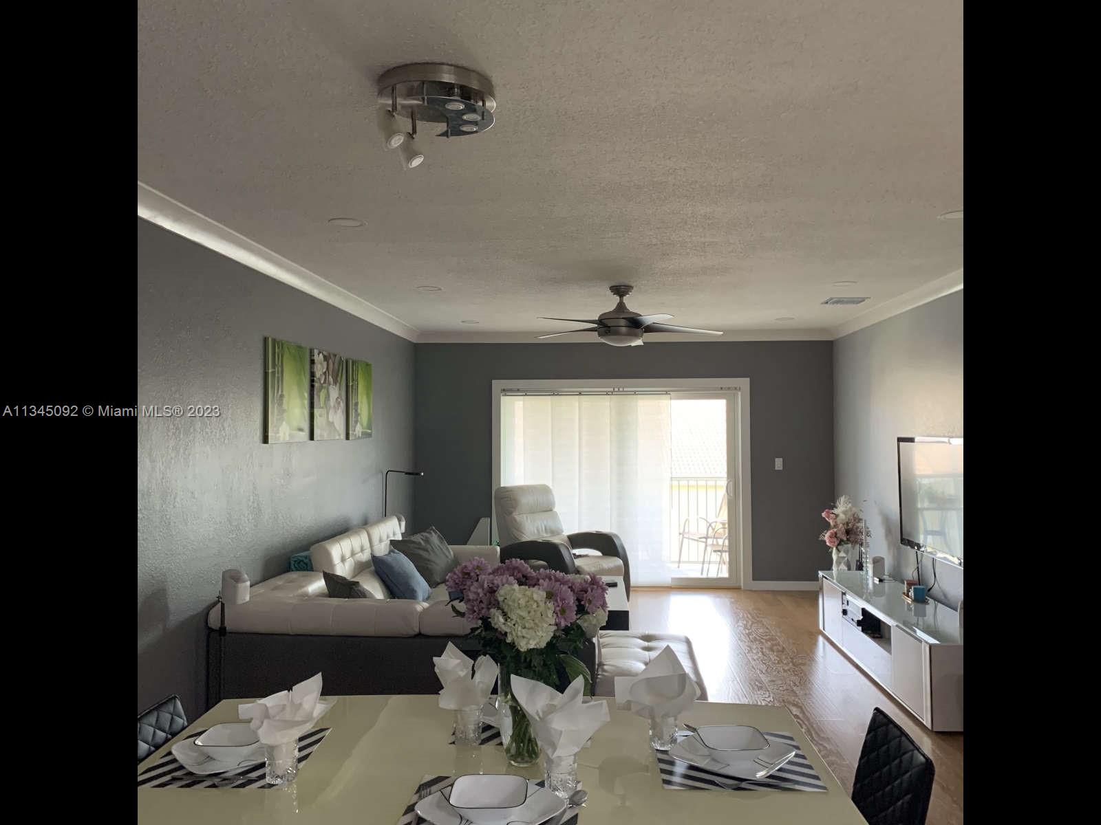 Beautiful corner apartment with more than $25,000 upgrades, located on the 3rd floor with an elevator. It has an open kitchen with dining and living room. Kitchen has stainless steel appliances and granite countertop. Master bedroom has two closets (one walk-in) and real wood on the floor. Both bathrooms have marble on floor and wall and glass sliding shower doors. The apartment has a washer and dryer, and laminate floor in the other rooms. It is newly renovated- freshly painted with crown molding and LED high lights in all the rooms. It has a new air conditioning unit, new duct work and new commercial grade hurricane impact windows and patio doors. It is located close to restaurants and the Coral Square Mall.