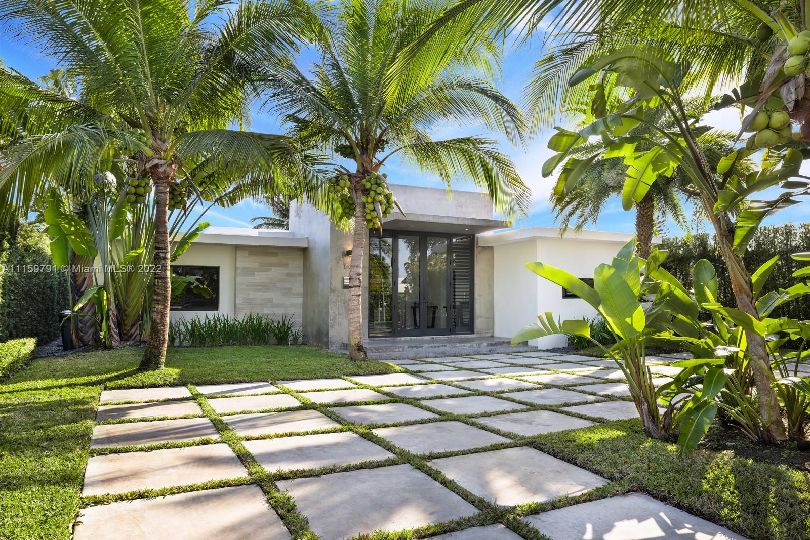 Located in the exclusive gated island of Biscayne Point, this waterfront turn-key modern bungalow style villa is a smart-home with 5 bedrooms and 3.5 baths. It was rebuilt in 2014 including new roof, impact glass windows, plumbing, electrical, AC... The home features high ceilings, a gourmet kitchen with top-of-the-line appliances, ample storage and limestone floors throughout. Oversized pool and davits for jet skis, fully fence with electric gates on circular driveway. 
Prime location minutes away from schools, restaurants, houses of worship, golf, tennis and the beach.