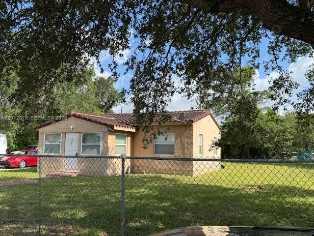 Single family home, tiled floor throughout, central air and heat situated on a 12,511sqft lot.  The inside driveway can accommodate more than 8 cars and a boat. The beach, Aventura mall, turnpike and I-95 are all within 15-30mins.