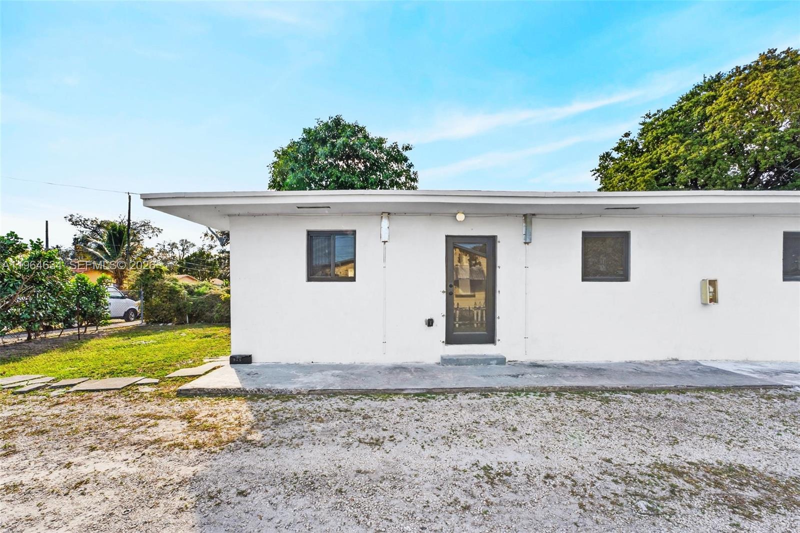 Newly and fully renovated, this 2-bedroom, 1-bath residence offers modern comfort and privacy as one half of a well-maintained duplex in a centralized Miami location. The bright interior features tile floors, a full kitchen with updated appliances, and an in-unit washer and dryer for everyday convenience. Complete impact windows and doors provide added peace of mind, while the fully fenced property enhances privacy. Enjoy two dedicated parking spaces directly in front plus additional guest parking. Water, sewer, trash, and lawn maintenance are included. Owner-occupied neighboring unit. No flood zone and easy access to I-95, shopping, and daily essentials.