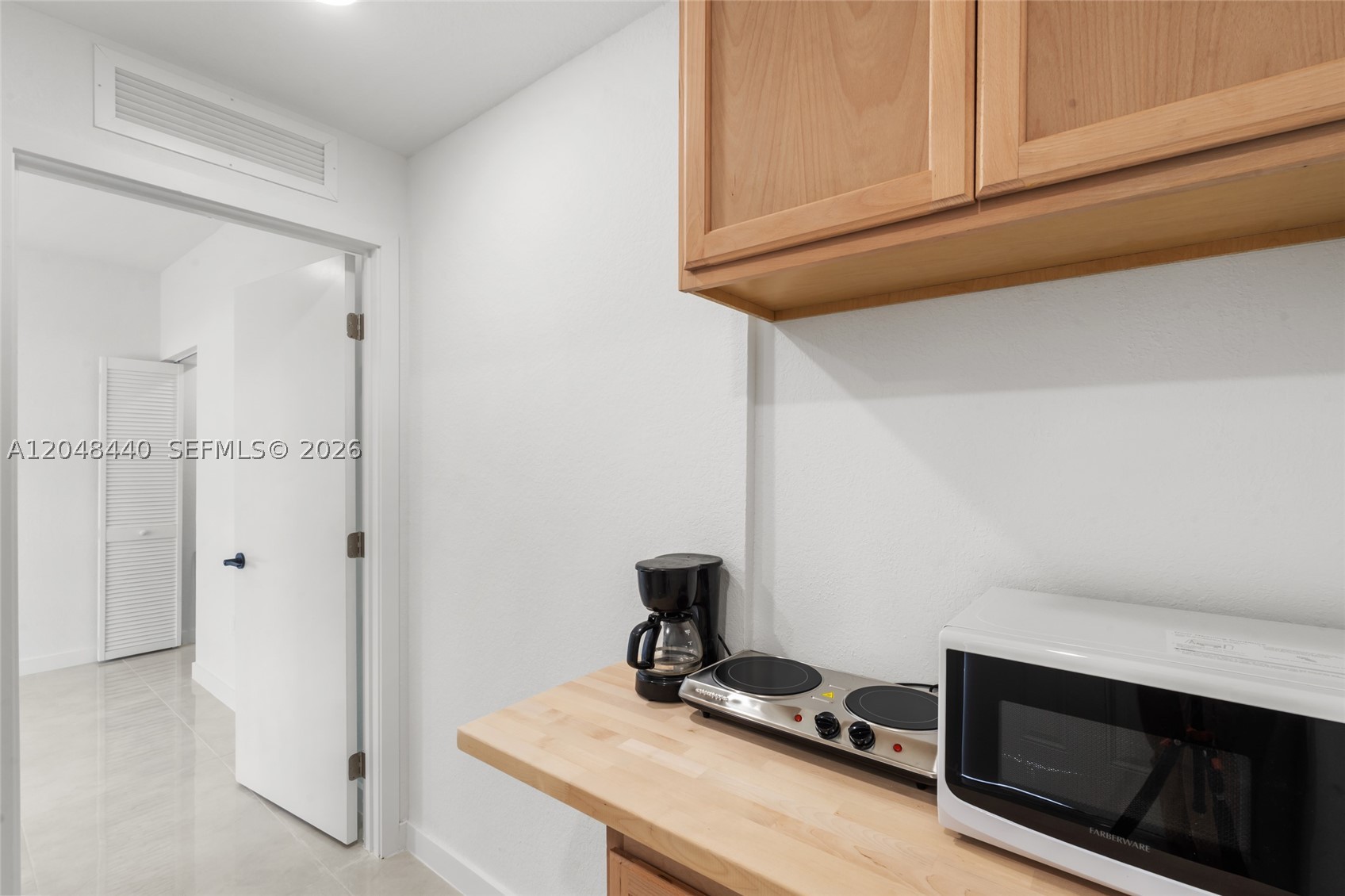 Utilities Included – Move In with First & Security! Studio/efficiency with an independent entrance, kitchenette, and a dedicated parking space. Rent includes WiFi, hot water, garbage disposal, and electricity, offering hassle-free living. Move in with only first month and security deposit—no last month required! Contact listing agent to coordinate showings.