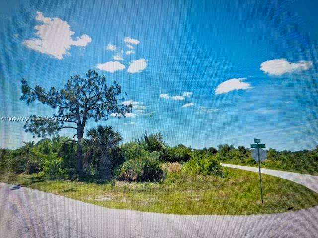 Make this nice spacious corner lot in Port Charlotte your new home. Build to suit. Some homes already built nearby. 
Pass by and see it.
Survey has already been conducted.