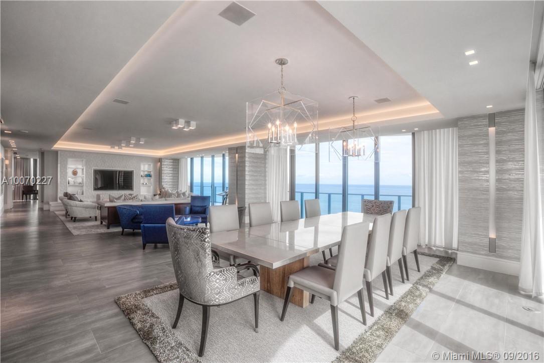 REDUCED FOR QUICK CLOSE-The highest available floor fully upgraded with 360 degrees of unobstructed views. 4 bd, 5.5 bth + family room/theater, 10ft high, floor to ceiling glass windows & custom Italian Interior Doors, Kreon lights throughout & recessed Ceiling Coves, Upgraded Crestron System includes sound, TVs, Automated Shades & Drapes. Sold upgraded but not furnished, except for installations.