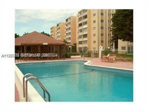 All ages welcome! Spacious 2 bedrooms, 2 baths corner unit on the 4th floor. Relax on the large screen in balcony with view of the garden and pool. This unit has large bedrooms, lots of storage & tile floors. Water is included in the rent. Amenities include community pool, shuffle board and clubhouse. Convenient location. Close to the beach and US 1, Publix, Panera Bread, Ross, Aventura Mall, restaurants, Gulfstream Shopping and casino. One assigned parking space and guest parking. Vacant. Easy to show on lockbox. See broker's remarks for showing instruction. No need to hit Show Assist.