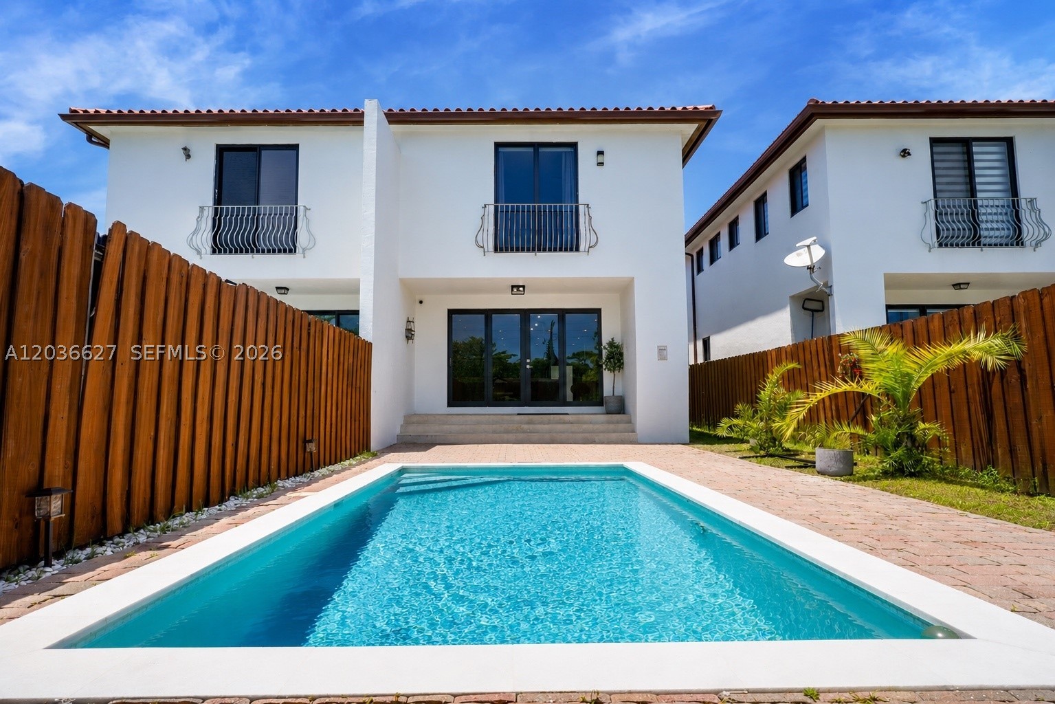 Fully remodeled villa-style residence in the highly desirable Coral Way neighborhood. This exceptional two-story home offers 2,185 SF of refined living space with 3 bedrooms, 3.5 bathrooms, and an elegant layout designed for modern living and entertaining. Enter through gated parking into a dramatic two-story foyer that opens to multiple living areas, formal dining, and a gourmet chef’s kitchen. Double glass doors lead to a private outdoor oasis featuring a newly resurfaced 10' x 20' swimming pool—an impressive size rarely found in townhomes—along with a spacious entertainment deck and lush fenced garden, creating the perfect setting for year-round South Florida living.

Upstairs, all three bedrooms are en-suite, including a luxurious primary suite with a spa-inspired bathroom, generous closet space, and abundant natural light. Premium features include impact windows and doors throughout, designer flooring, fully remodeled kitchen and baths, security system, gated entry, and an enclosed one-car garage.

Ideally located in the heart of Coral Way, just minutes from Coral Gables, Coconut Grove, Brickell, and Downtown Miami. Enjoy easy access to some of Miami’s finest dining, shopping, parks, schools, and cultural destinations. Combining location, privacy, style, and exceptional indoor-outdoor living, this move-in-ready residence presents a rare opportunity to own a distinctive home with a private pool in one of Miami’s most sought-after neighborhoods.
