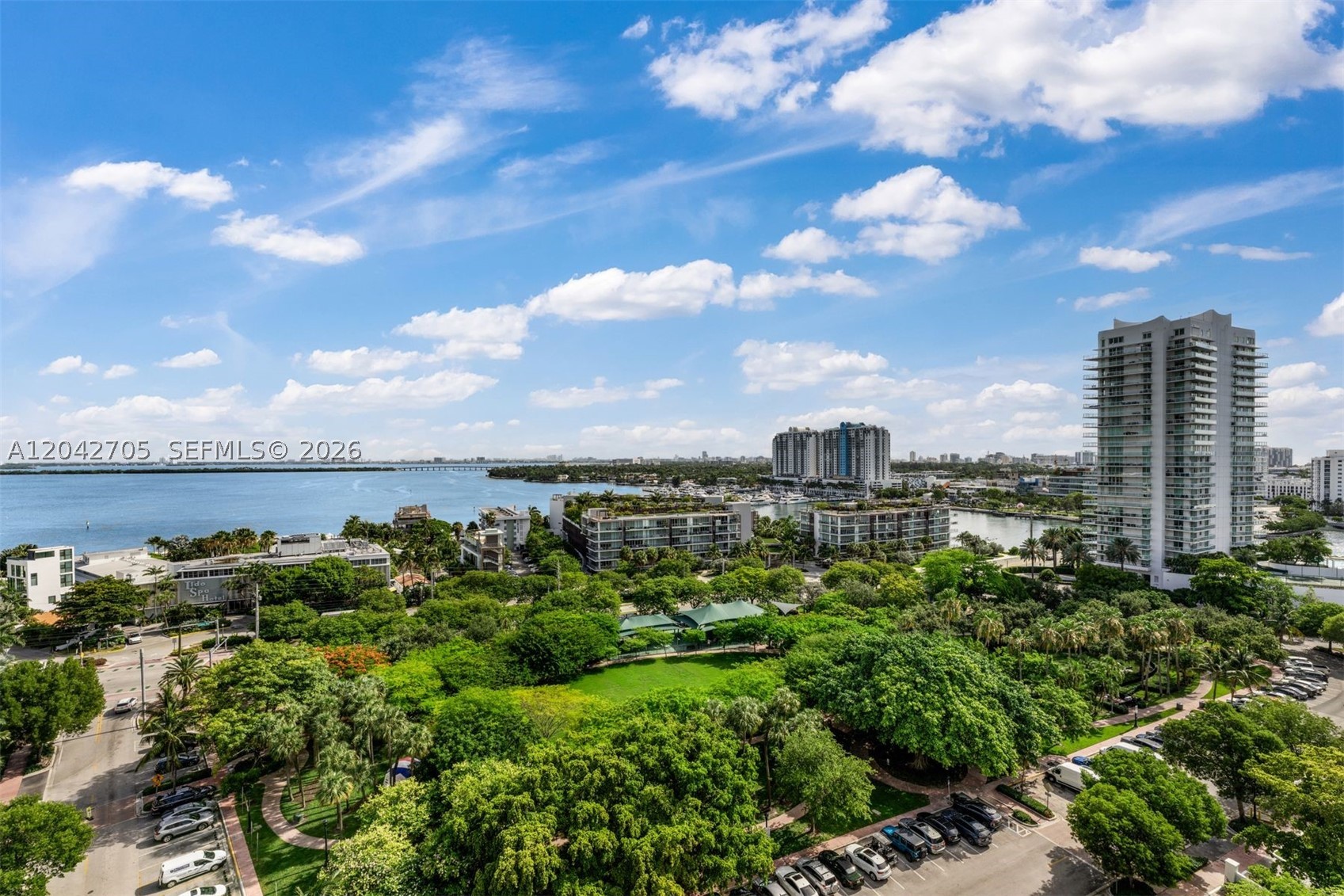 Rare opportunity to reimagine and create a one-of-a-kind residence at Nine Island, where luxury meets location. Offering 2,388 SF, this east-facing 3-bedroom, 3-bath condo features an expansive floor plan, a dedicated laundry room, and endless potential to transform the space into an exceptional home. Two oversized balconies showcase sweeping views of Belle Isle Park, Biscayne Bay and Miami Beach. Recently installed impact windows and doors provide an excellent foundation for a future renovation.
Nine Island is currently undergoing a comprehensive renovation of the pool deck and exterior amenities, scheduled for completion in 2027. Recent building improvements include a new roof, beautifully renovated lobby, and updated mezzanine. Residents enjoy a state-of-the-art fitness center, children's playroom, private marina, tennis court, and Bay Room for entertaining. Ideally located on the Venetian Islands, just moments from Sunset Harbor's restaurants, shops, markets, parks, and dog park. A rare chance to create a signature waterfront residence in one of Miami Beach's most desirable locations.