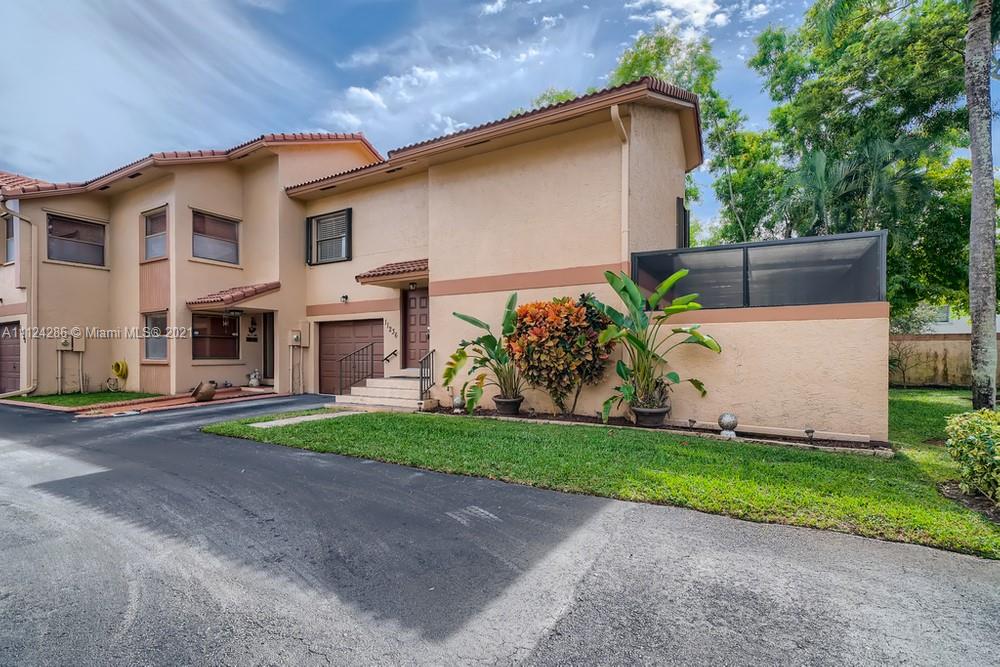 Hope you are ready to fall in love with this exquisite 2 bedroom, 2.5 bathroom corner unit townhouse, situated in the sought-after Heron's Landing community! On the main floor, a spacious family room opens to the dining room and well-acquainted kitchen. The galley kitchen is adorned with beautiful cabinets and stainless steel appliances. From the kitchen, you can access your screened patio. Just imagine hosting get-togethers or having your morning coffee on your large private patio! This home has a charming primary suite on the second floor with a sizable closet and an ensuite bathroom with double sink vanity. The community boasts a pool, gym, and racquetball courts. This home is conveniently located close to I-75, the Pembroke Lakes Mall, eateries, schools, and parks!